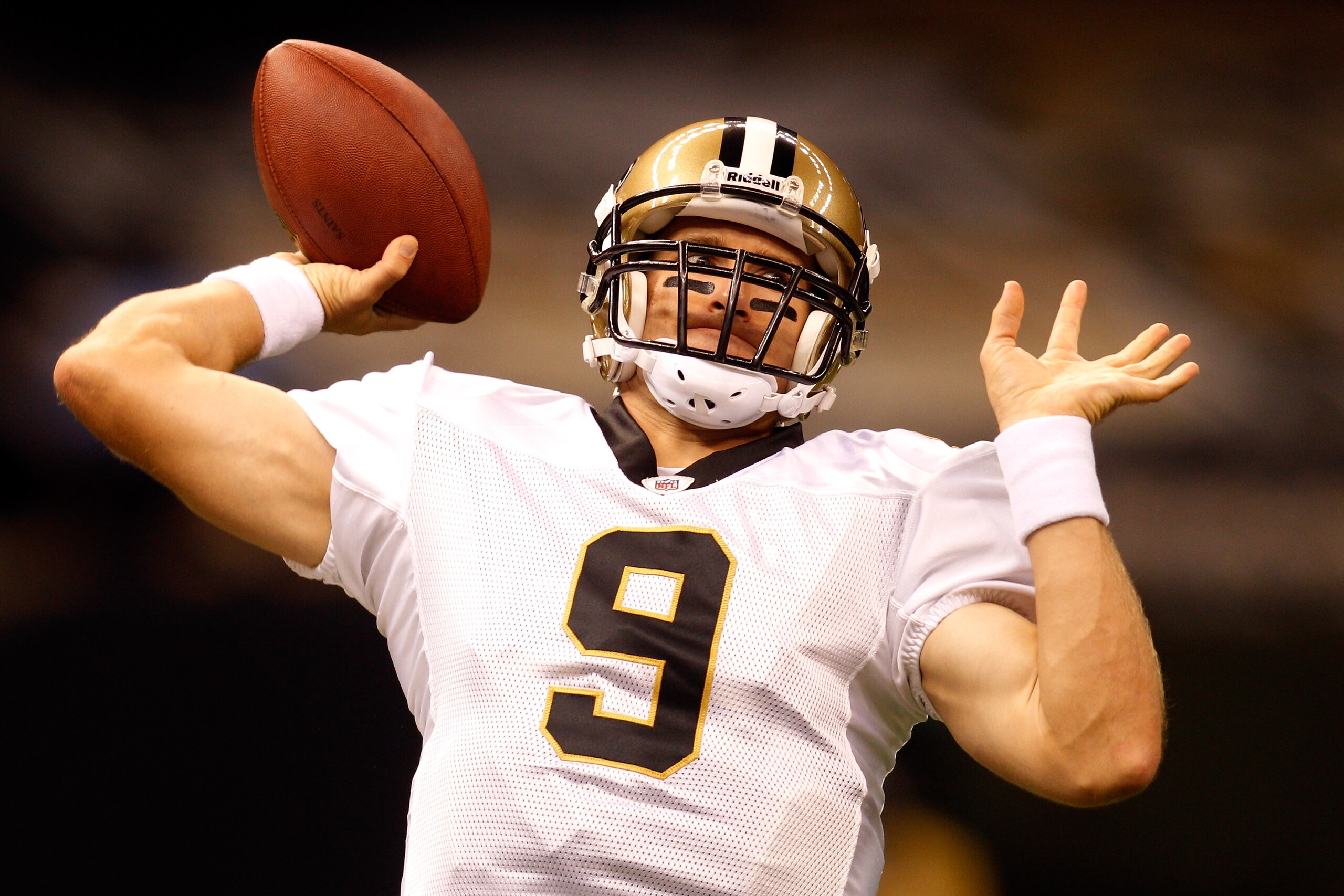 NEW ORLEANS - AUGUST 21:  Quarterback Drew Brees #9 of the New Orleans Saints warms up during pregame before playing the Houston Texans at the Louisiana Superdome on August 21, 2010 in New Orleans, Louisiana.  (Photo by Chris Graythen/Getty Images)