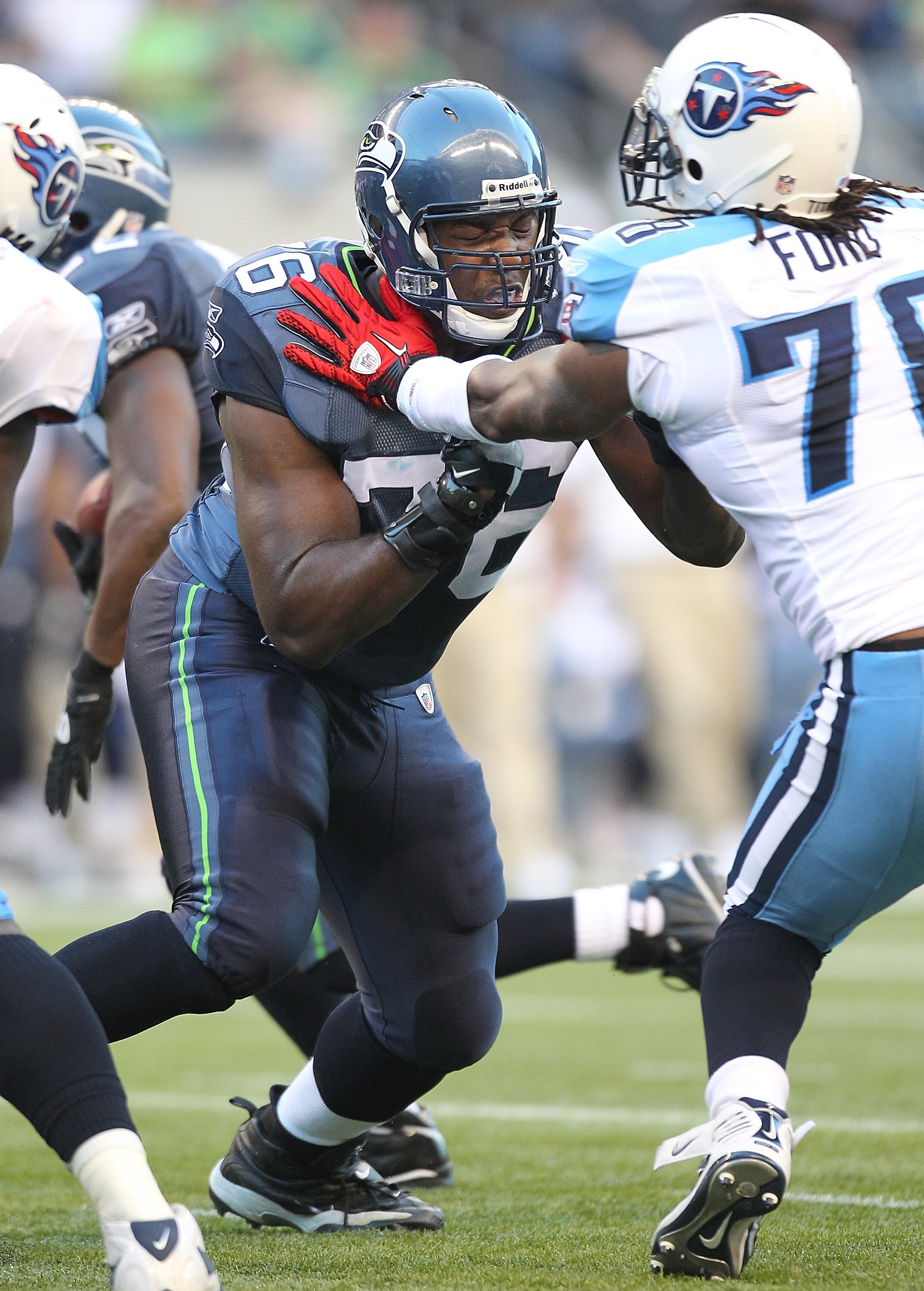 SEATTLE - AUGUST 14:  Tackle Russell Okung #76 of the Seattle Seahawks pass blocks against Jacob Ford #78 during the preseason game against the Tennessee Titans at Qwest Field on August 14, 2010 in Seattle, Washington. The Seahawks defeated the Titans 20-