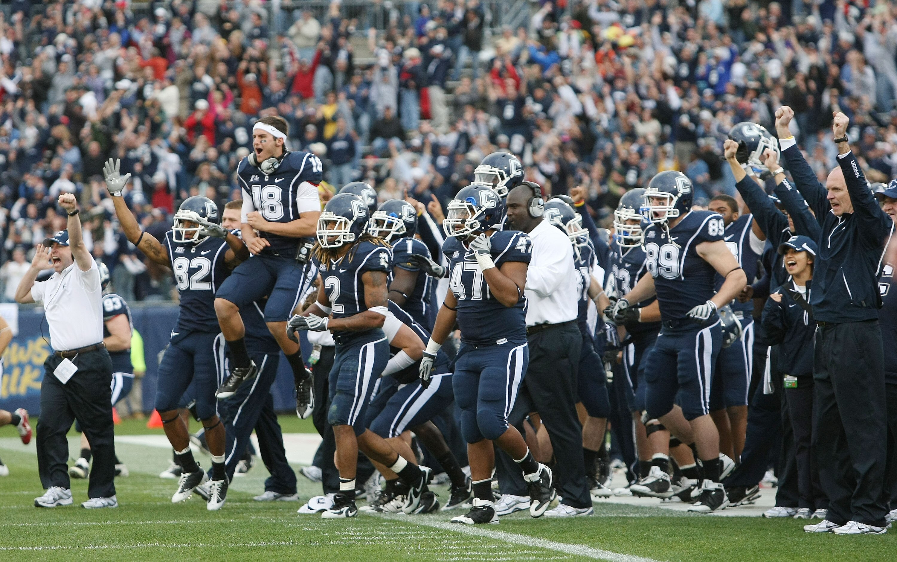 EAST HARTFORD, CT - OCTOBER 31:  The Connecticut Huskies bench celebrates a touchdown in the final minute of the game against the Rutgers Scarlet Knights on October 31, 2009 at Rentschler Field in East Hartford, Connecticut. Rutgers came back and defeated