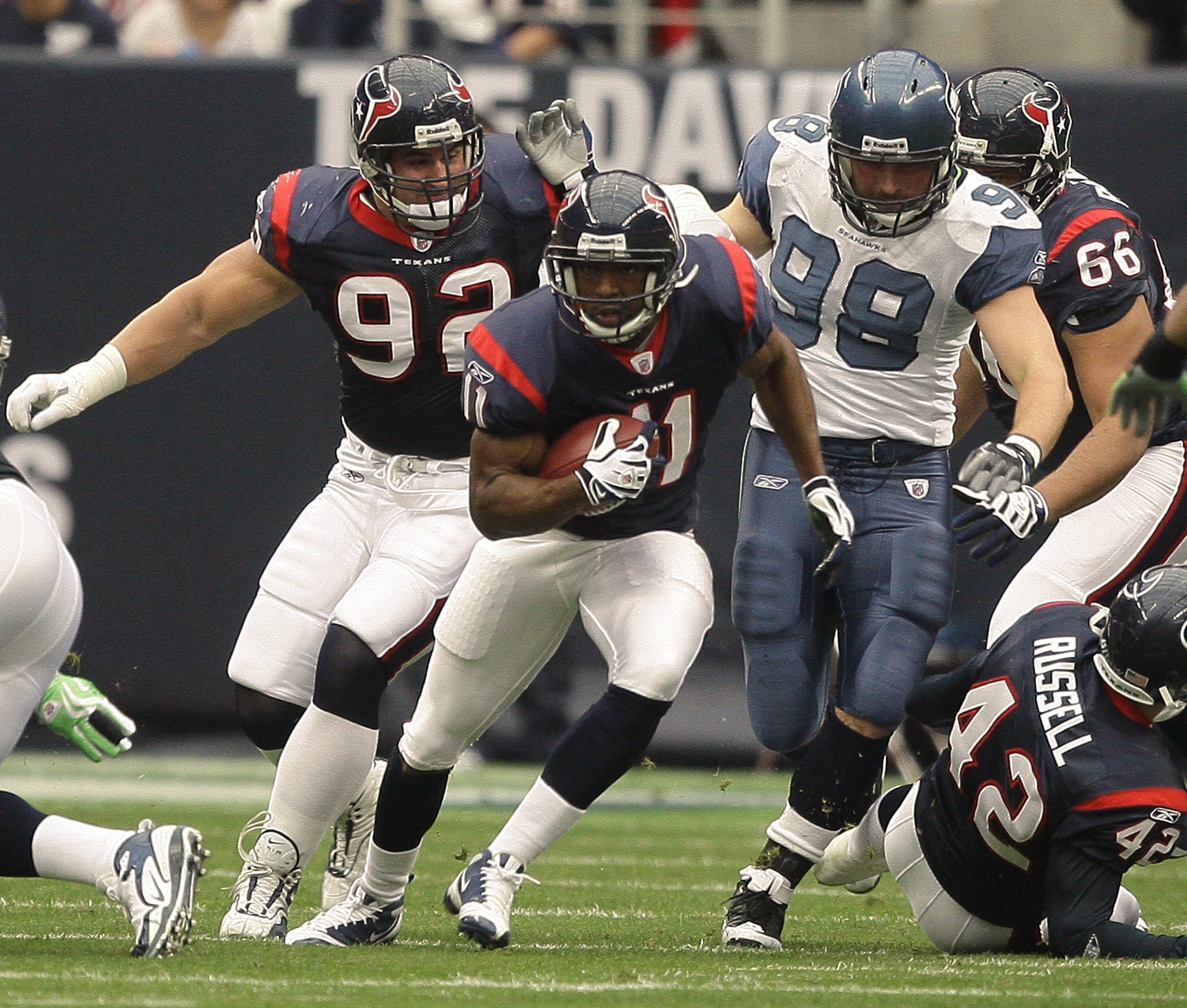 HOUSTON - DECEMBER 13:  Kick returner Andre Davis #11 looks for room to run against the Seattle Seahawks at Reliant Stadium on December 13, 2009 in Houston, Texas.  (Photo by Bob Levey/Getty Images)