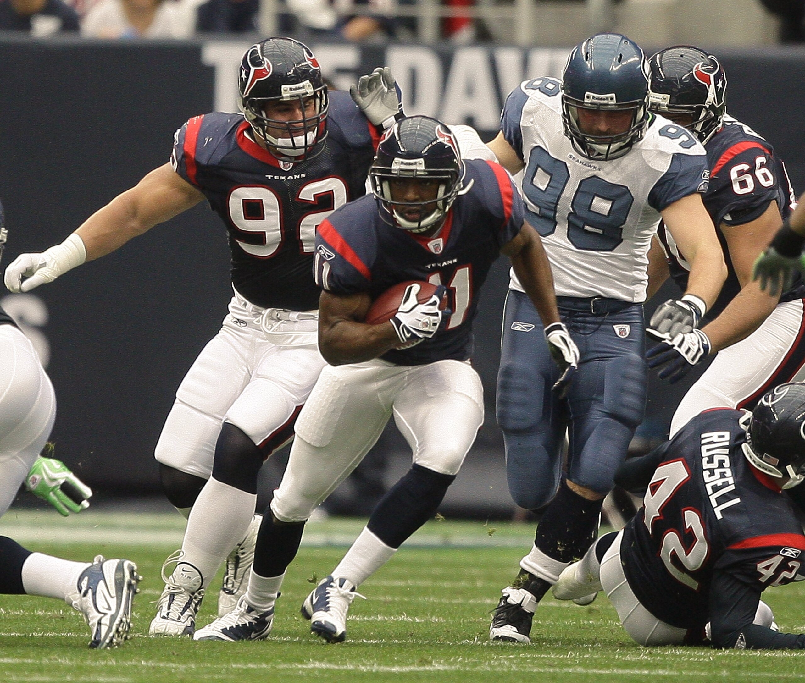 HOUSTON - DECEMBER 13:  Kick returner Andre Davis #11 looks for room to run against the Seattle Seahawks at Reliant Stadium on December 13, 2009 in Houston, Texas.  (Photo by Bob Levey/Getty Images)
