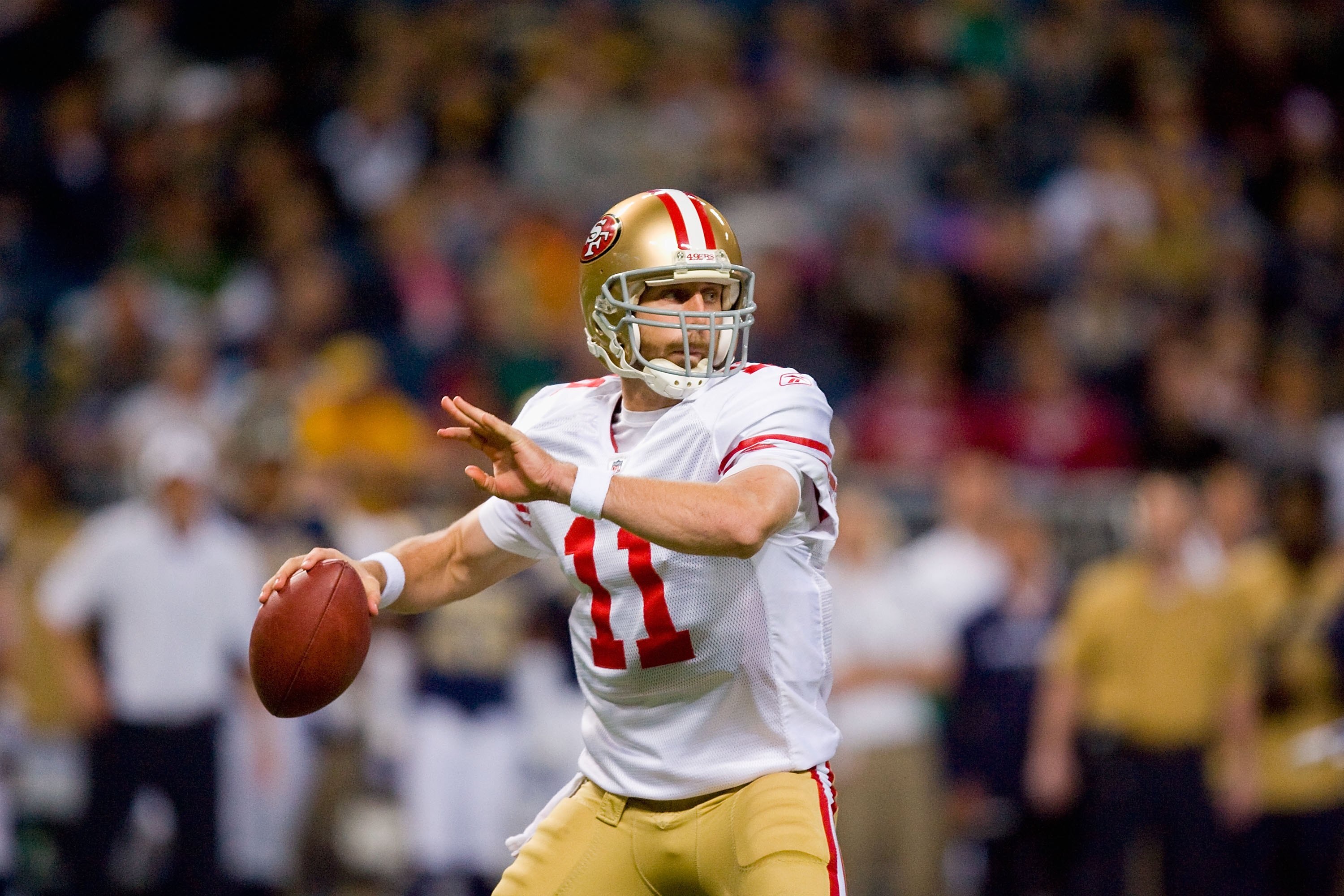 ST. LOUIS - JANUARY 3: Quarterback Alex Smith #11 of the San Francisco 49ers looks to pass the ball during the game against the St. Louis Rams at the Edward Jones Dome on January 3, 2010 in St. Louis, Missouri.  The 49ers beat the Rams 28-6.  (Photo by Di