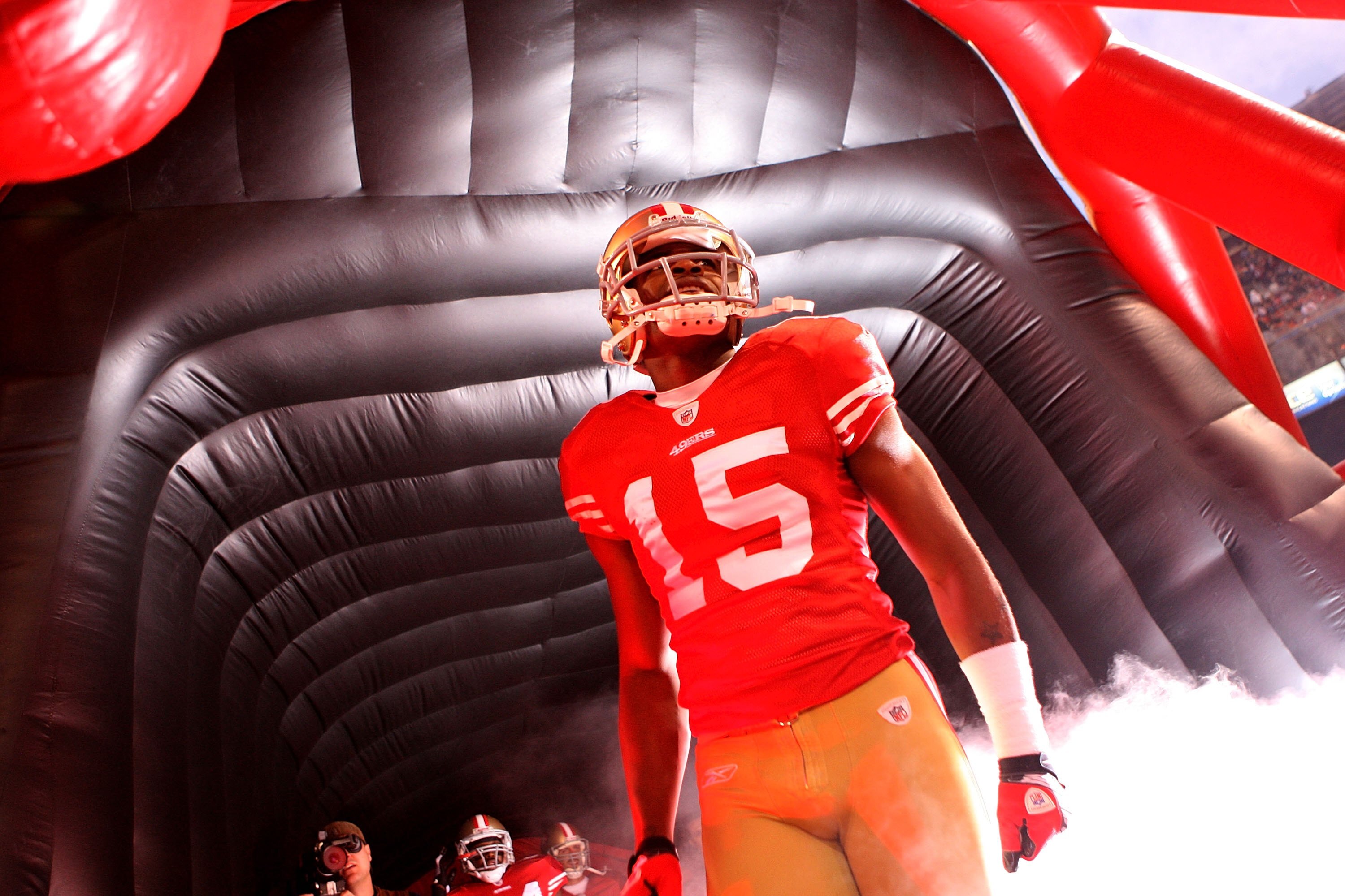 SAN FRANCISCO - NOVEMBER 12:  Michael Crabtree #15 of the San Francisco 49ers is introduced prior to his game against the Chicago Bears at Candlestick Park on November 12, 2009 in San Francisco, California.  (Photo by Jed Jacobsohn/Getty Images)
