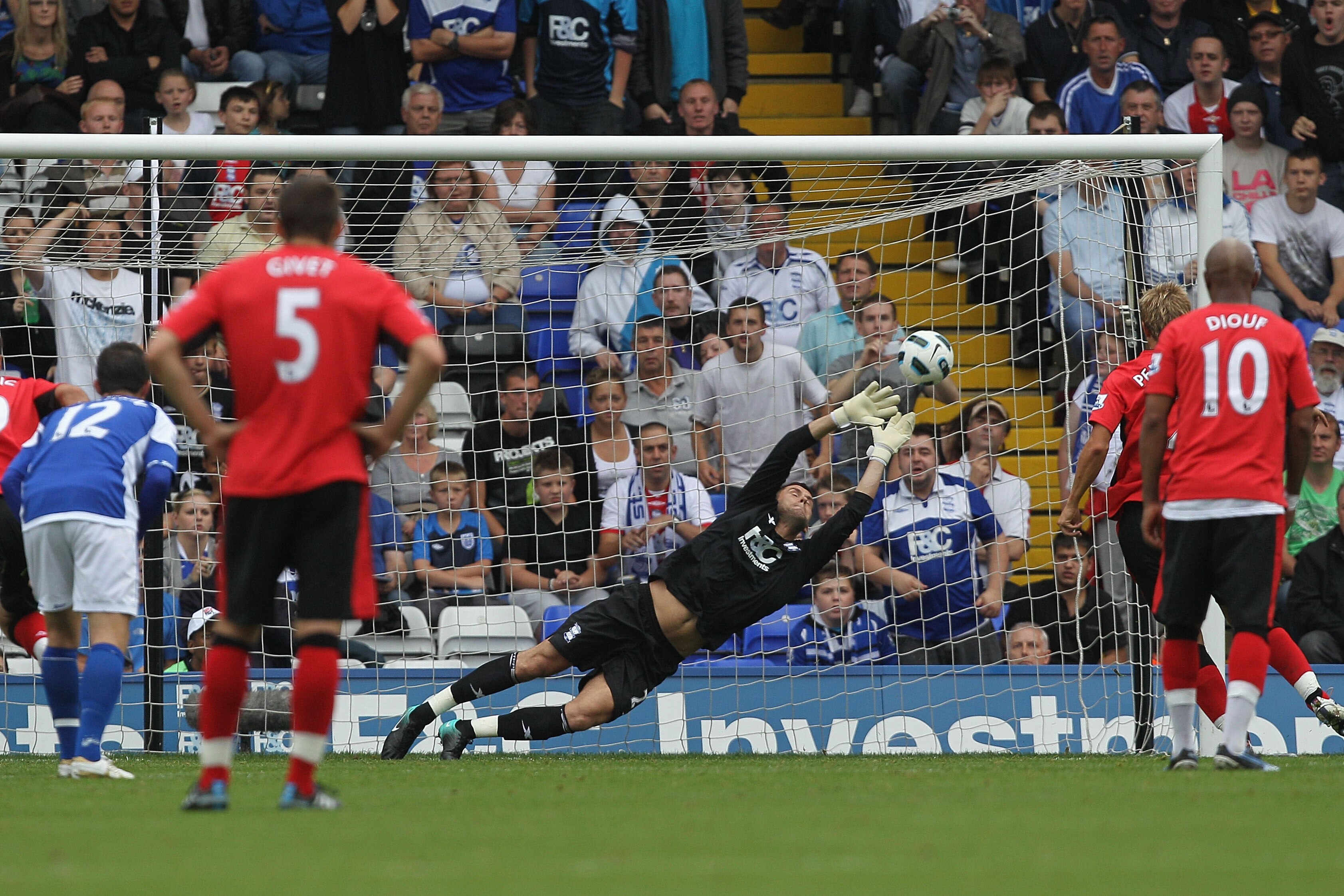 BIRMINGHAM, ENGLAND - AUGUST 21:  Ben Foster goalkeeper for Birmingham saves a penalty from Morten Gamst Pedersen of Blackburnduring the Barclays Premier League match between Birmingham City and Blackburn Rovers at St Andrew's Stadium on August 21, 2010 i