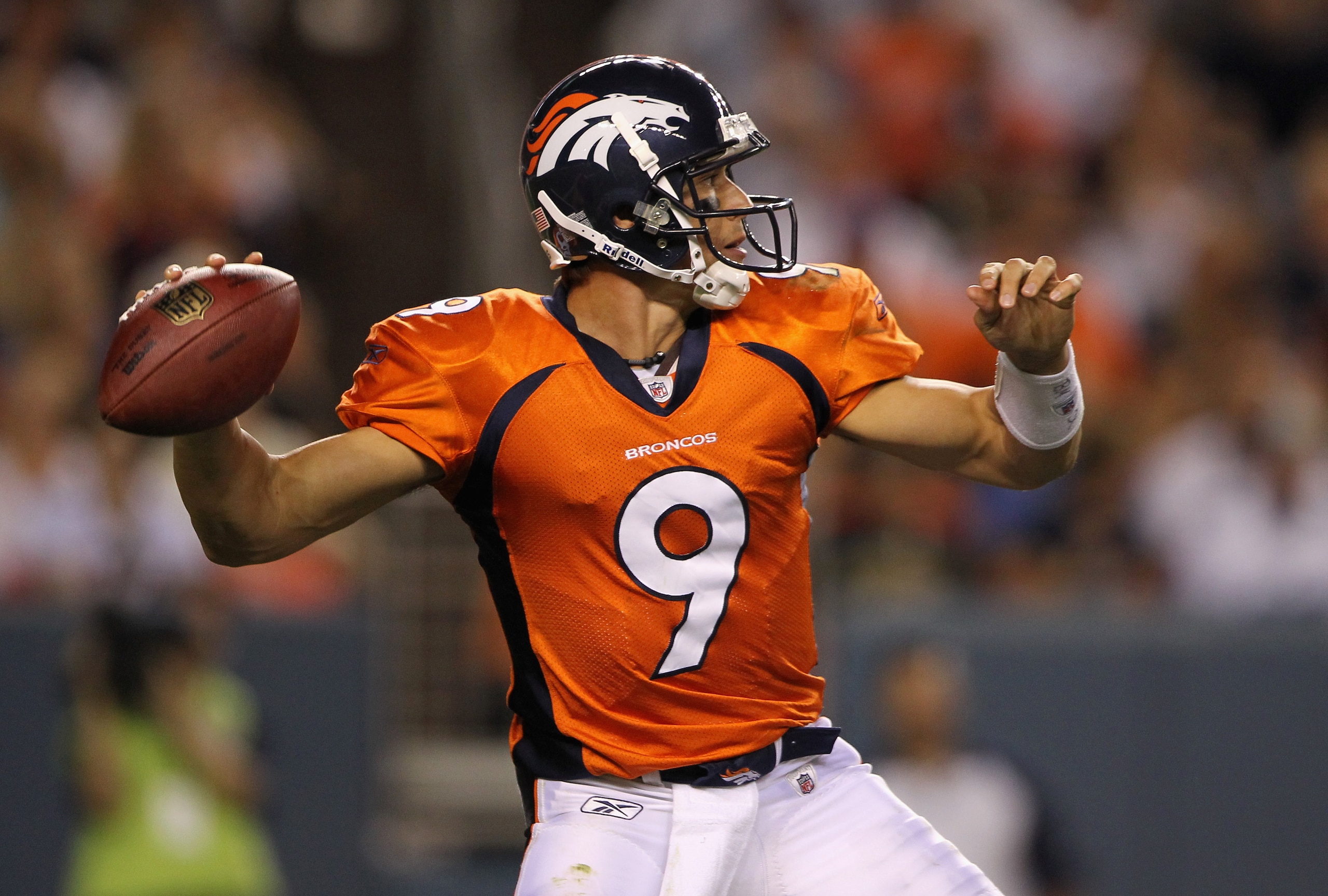 DENVER - AUGUST 21:  Quarterback Brady Quinn #9 of the Denver Broncos delivers a pass against the Detroit Lions during preseason NFL action at INVESCO Field at Mile High on August 21, 2010 in Denver, Colorado. The Lions defeated the Broncos 25-20.  (Photo