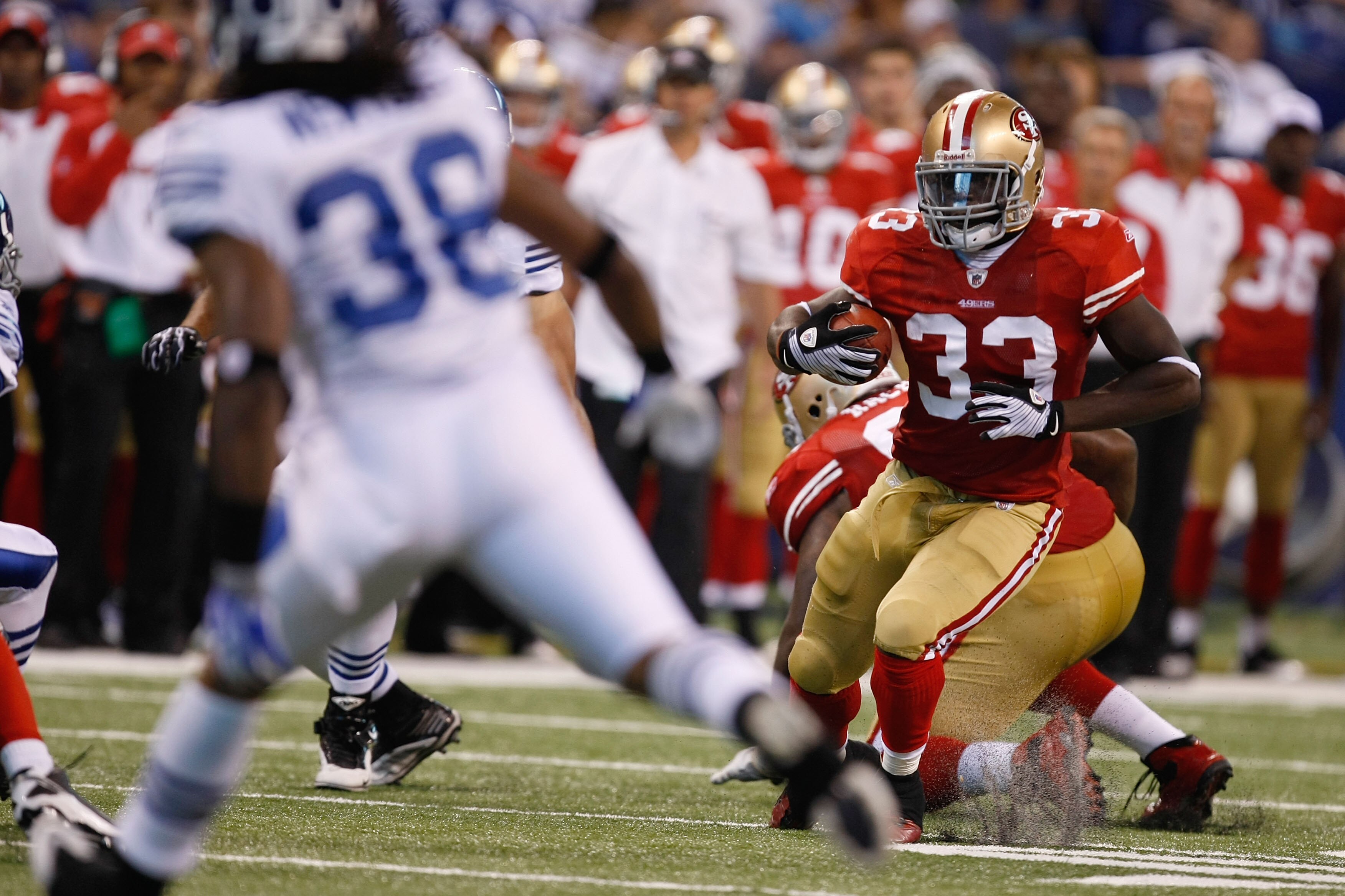 INDIANAPOLIS, IN - AUGUST 15: Anthony Dixon #33 of the San Francisco 49ers runs against the Indianapolis Colts during the preseason game at Lucas Oil Stadium on August 15, 2010 in Indianapolis, Indiana.  (Photo by Scott Boehm/Getty Images)
