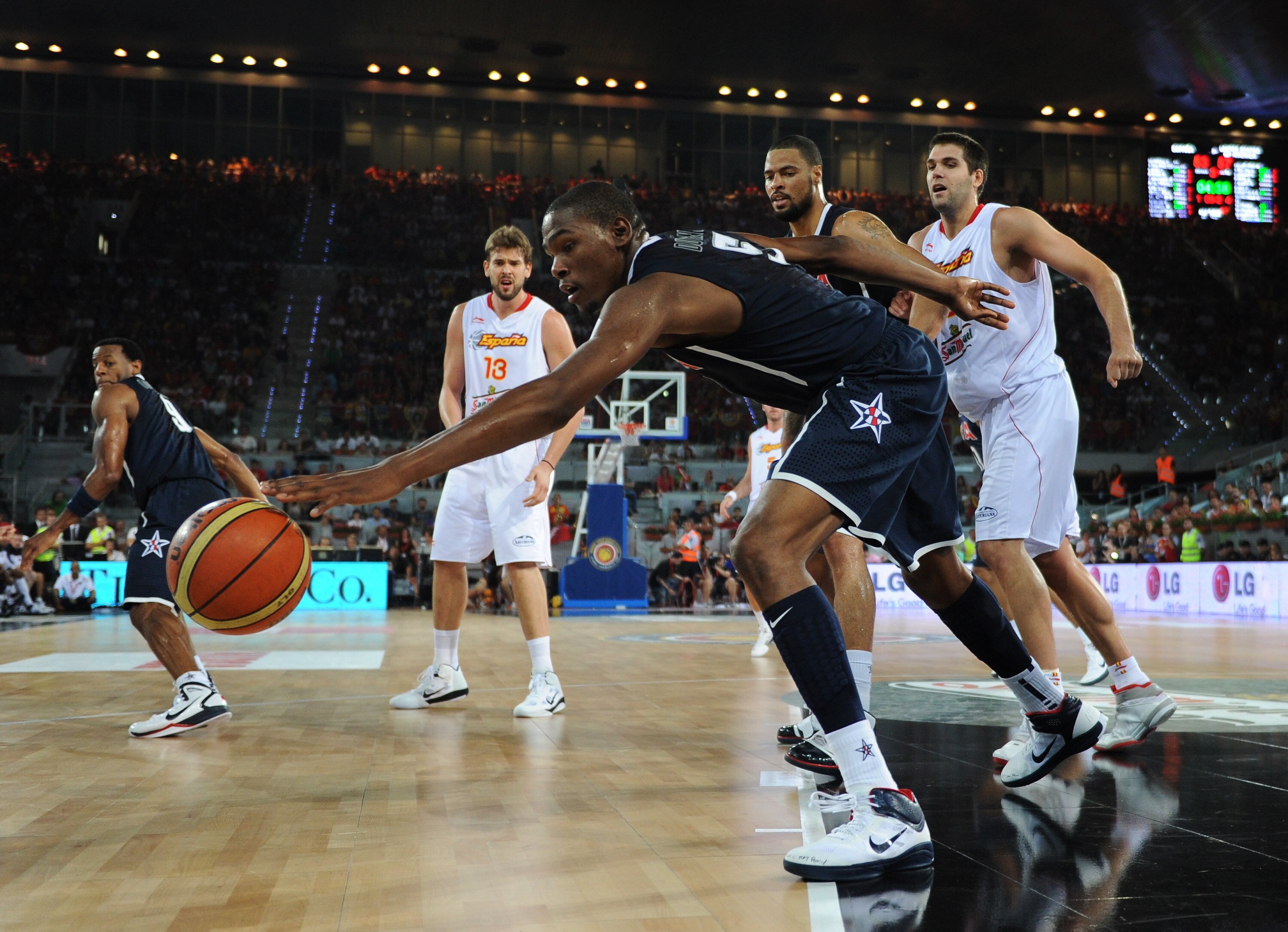 MADRID, SPAIN - AUGUST 22:  Kevint Durant of the USA stretches for a ball during a friendly basketball game between Spain and the USA at La Caja Magica on August 22, 2010 in Madrid, Spain.  (Photo by Jasper Juinen/Getty Images)