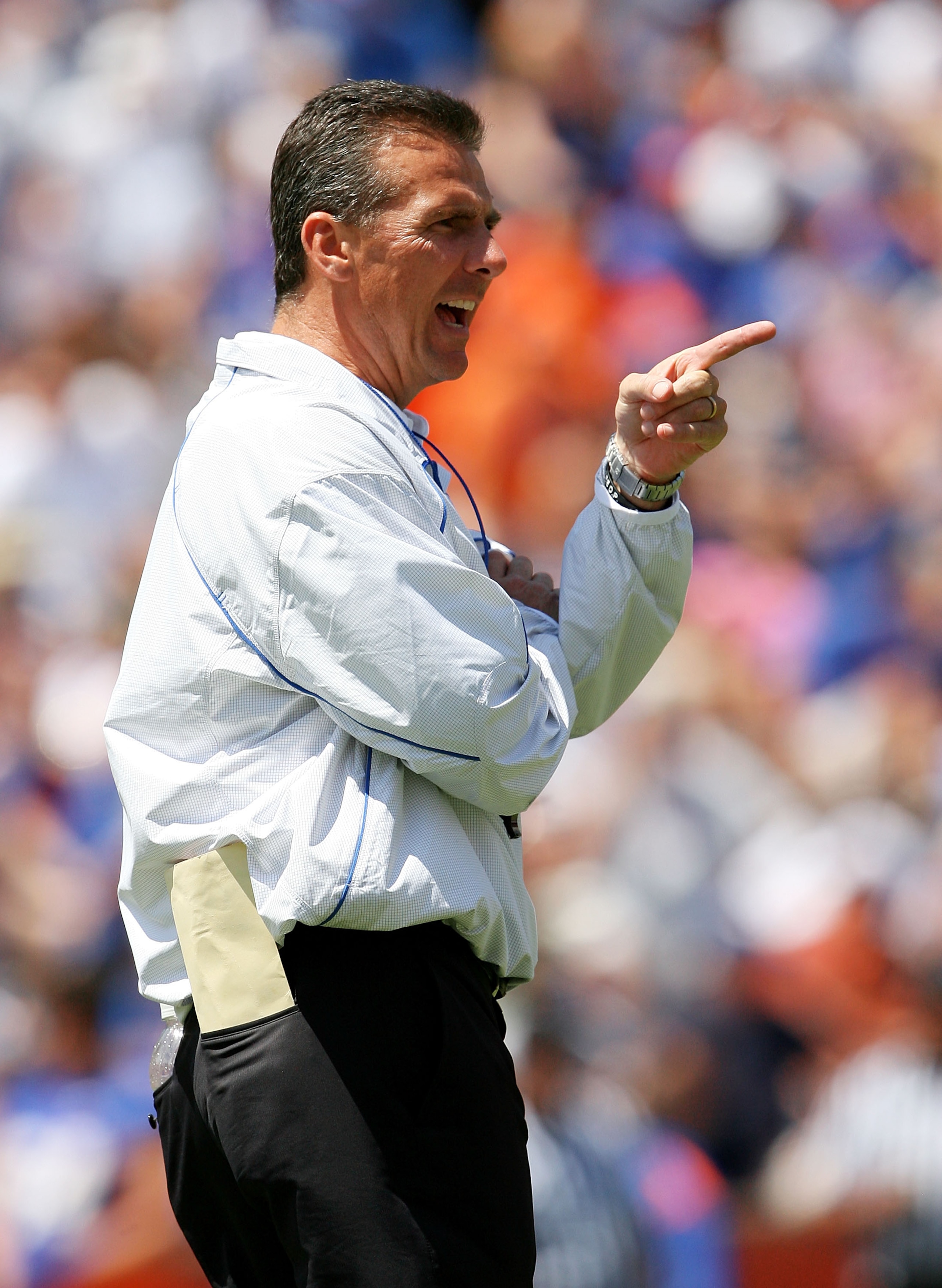 GAINESVILLE, FL - APRIL 10:  Head coach Urban Meyer of the Florida Gators coaches his team during the Orange & Blue game at Ben Hill Griffin Stadium on April 10, 2010 in Gainesville, Florida.  (Photo by Doug Benc/Getty Images)