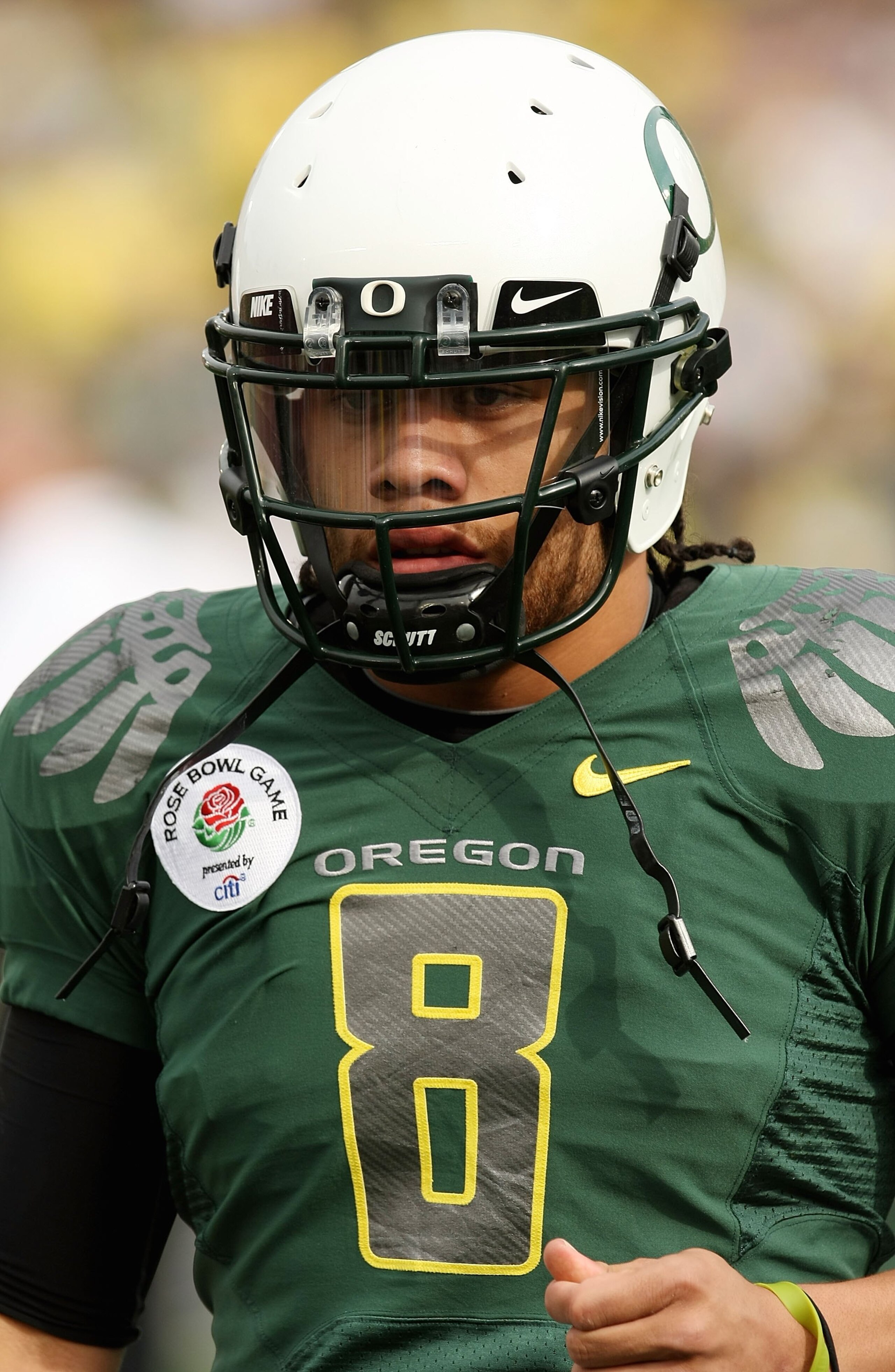 PASADENA, CA - JANUARY 01:  Quarterback Jeremiah Masoli #8 of the Oregon Ducks jogs off the field during the game against the Ohio State Buckeyes in the 96th Rose Bowl game on January 1, 2010 in Pasadena, California.  (Photo by Stephen Dunn/Getty Images)