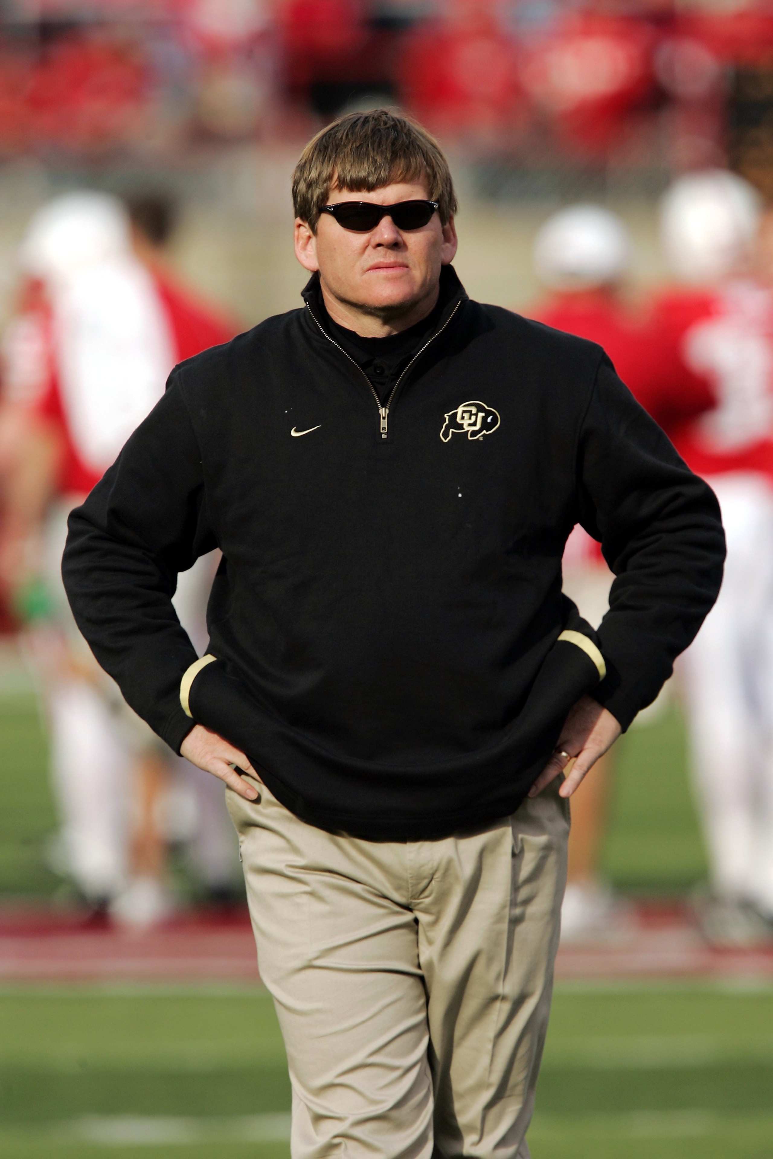 LINCOLN, NE - NOVEMBER 24:  Head coach Dan Hawkins of the Colorado Buffaloes watches his team warm up before a game against the Nebraska Cornhuskers on November 24, 2006 at Memorial Stadium in Lincoln, Nebraska.  Nebraska won 37-14.  (Photo by Brian Bahr/