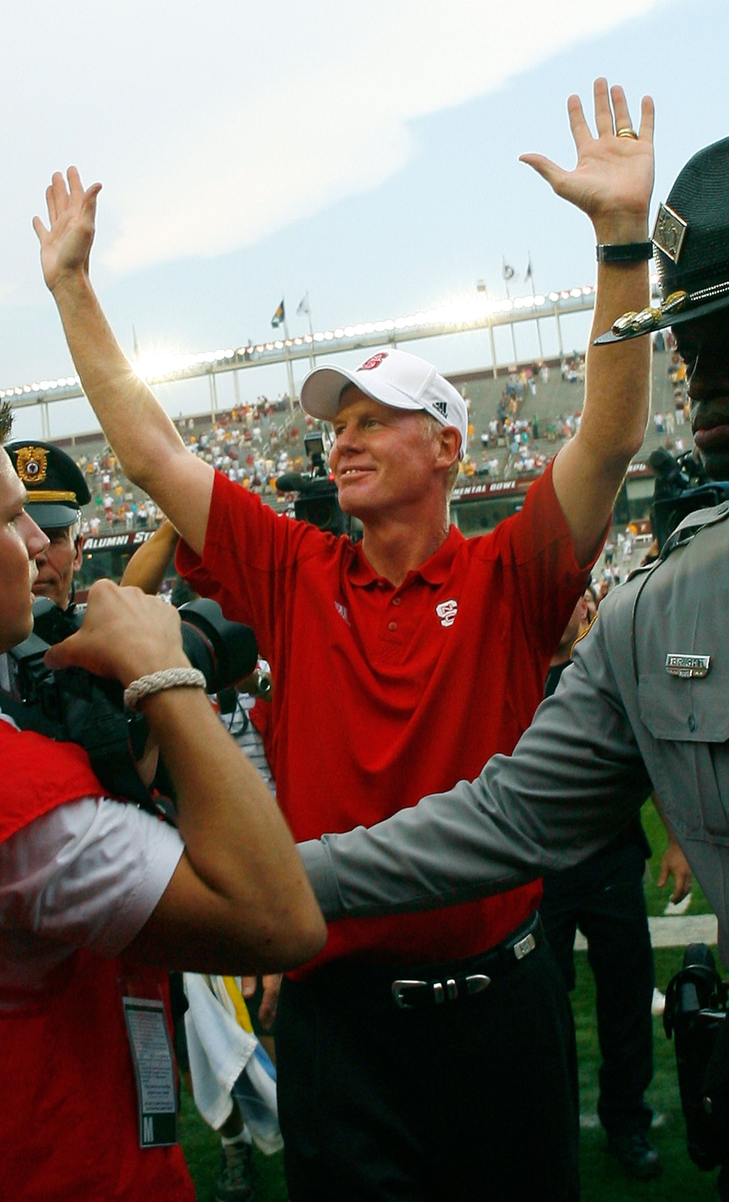 CHESTNUT HILL - SEPTEMBER 8:  Coach Tom O'Brien of the North Carolina Wolfpack leaves the field after a game with the Boston College Eagles at Alumni Stadium September 8, 2007 in Chestnut Hill, Massachusetts. (Photo by Jim Rogash/Getty Images)