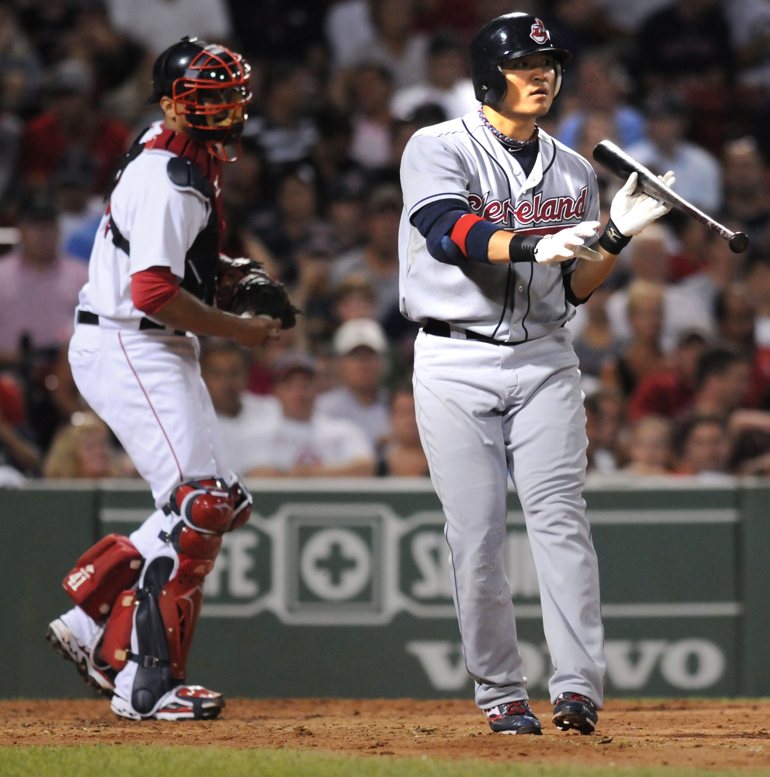 BOSTON, MA - AUGUST 5:  Shin Soo Choo #17 of the Cleveland Indians attempts a bunt against the Boston Red Sox August 5, 2010 at Fenway Park in Boston, Massachusetts. (Photo by Darren McCollester/Getty Images)