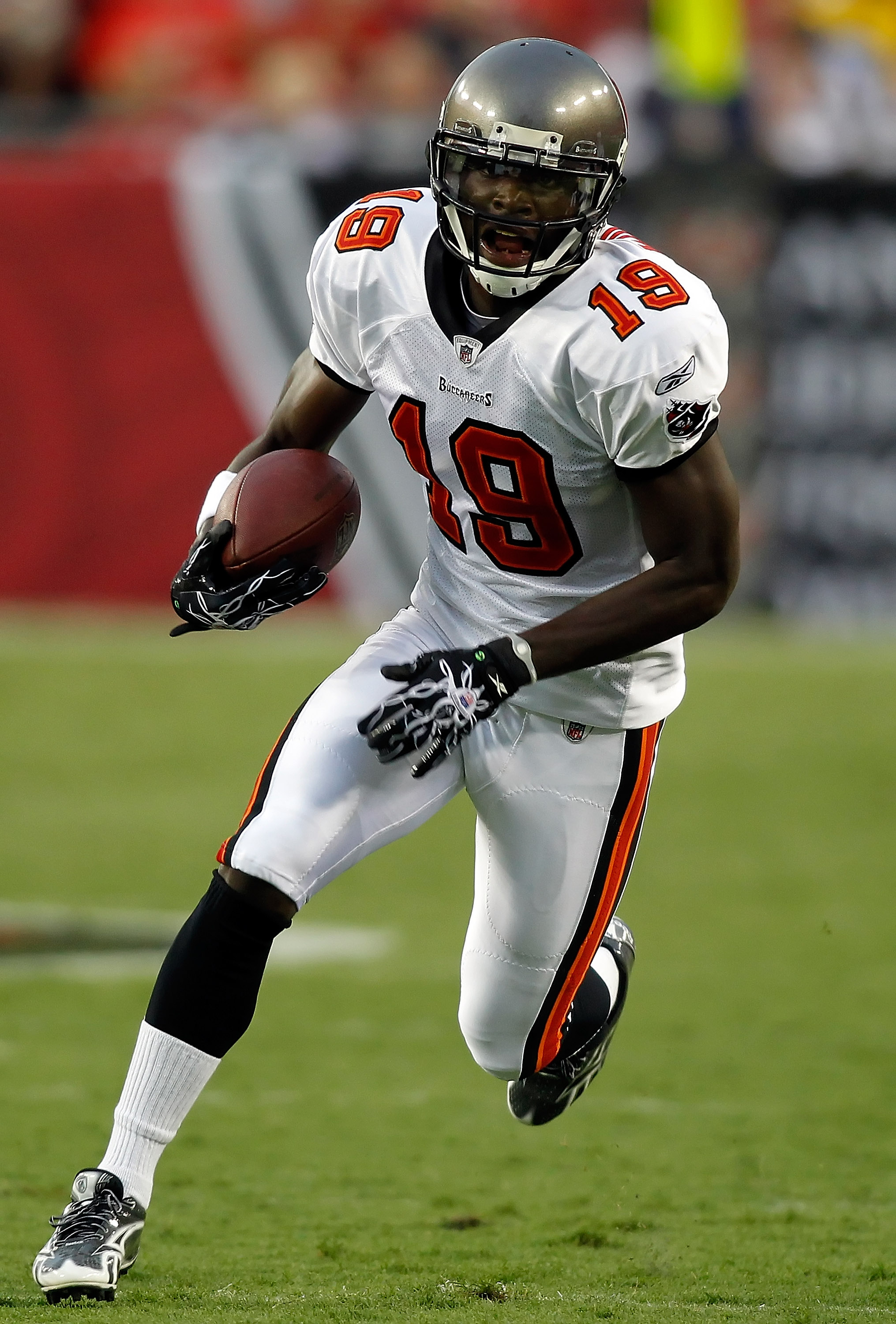 TAMPA, FL - AUGUST 21:  Receiver Mike Williams #19 of the Tampa Bay Buccaneers runs after a reception against the Kansas City Chiefs during a preseason game at Raymond James Stadium on August 21, 2010 in Tampa, Florida.  (Photo by J. Meric/Getty Images)