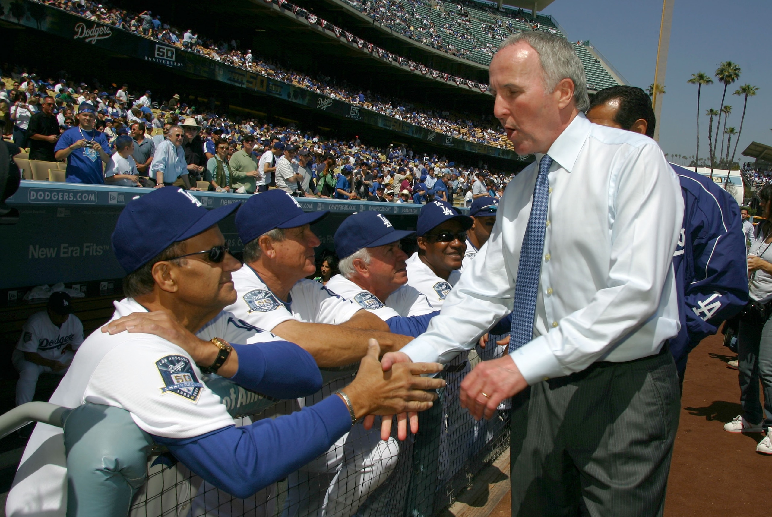 LOS ANGELES, CA - MARCH 31:  Los Angeles Dodger manager Joe Torre#6 shakes hands with Dodger owner Frank McCourt before the Opening Day game against the San Francisco Giants at Dodger Stadium on March 31, 2008 in Los Angeles, California.  (Photo by Jeff G