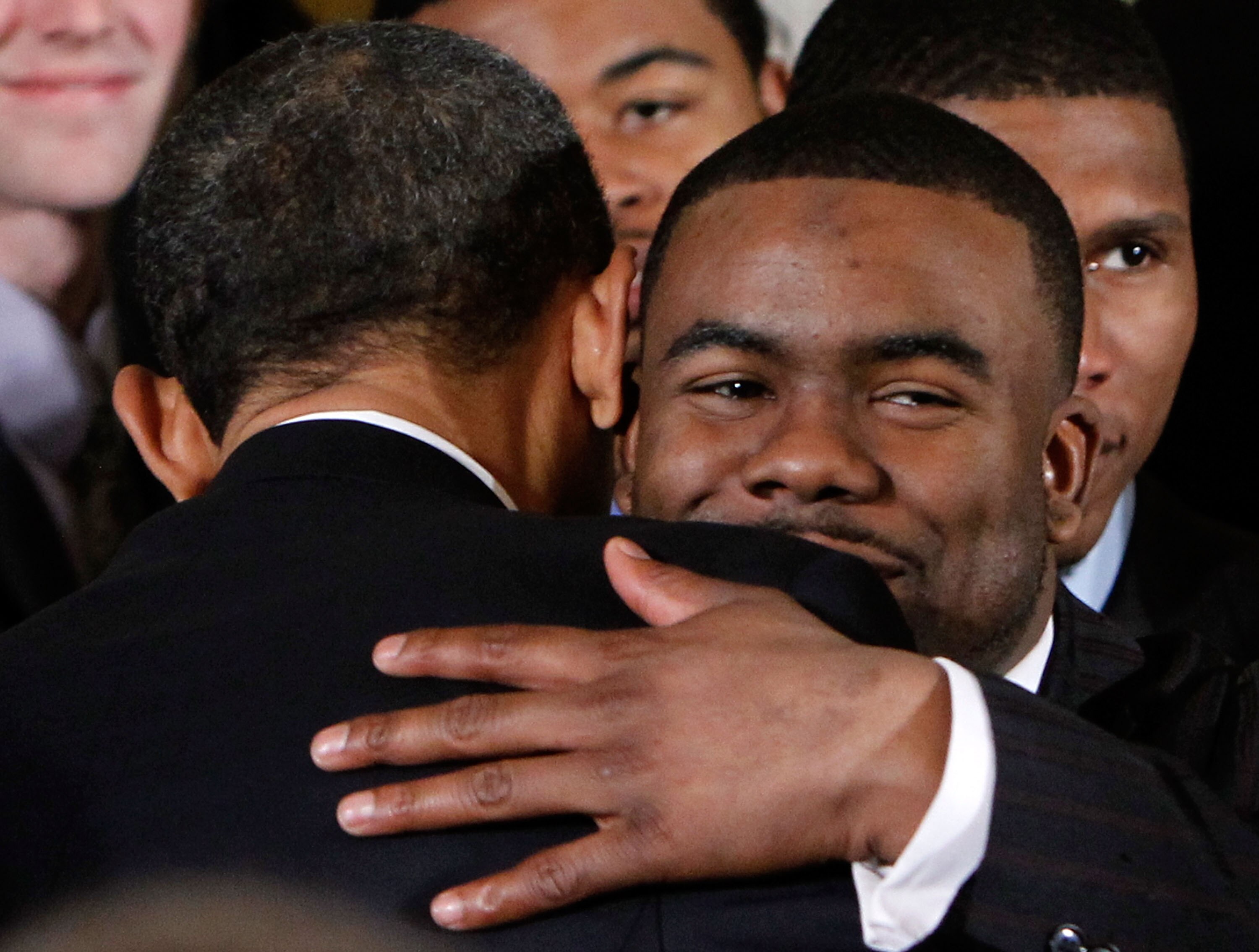 WASHINGTON - MARCH 08:  U.S. President Barack Obama (L) hugs Heisman Trophy winner and running back Mark Ingram (R) during an East Room event to host members of the Alabama Crimson Tide March 8, 2010 at the White House in Washington, DC. Obama welcomed th