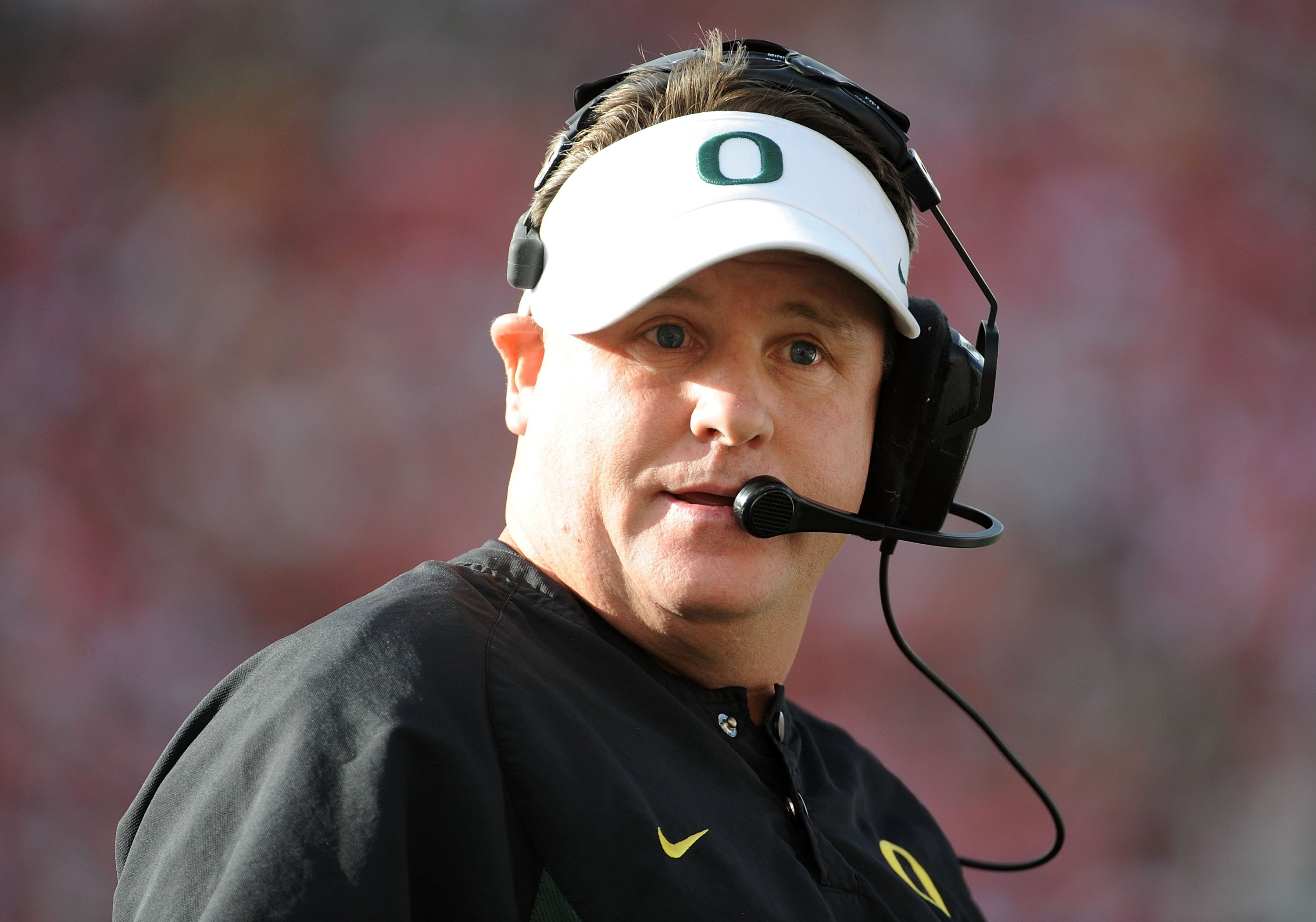 PASADENA, CA - JANUARY 01:  Head coach Chip Kelly of the Oregon Ducks stands on the sidelines during the game against the Ohio State Buckeyes at the 96th Rose Bowl game on January 1, 2010 in Pasadena, California.  (Photo by Harry How/Getty Images)