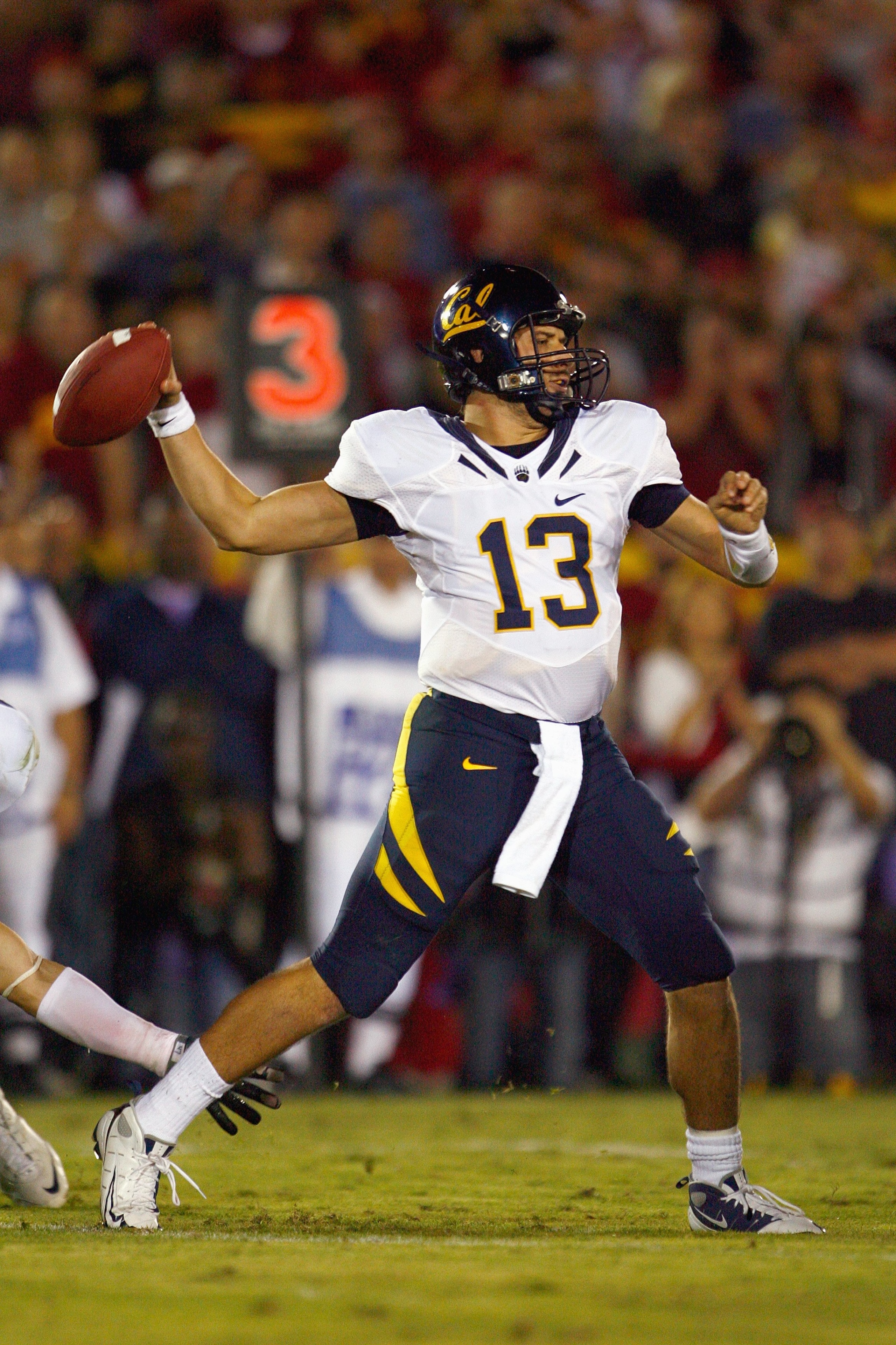 LOS ANGELES - NOVEMBER 8:  Quarterback Kevin Riley #13 of the Cal Golden Bears passes the ball during the game against the USC Trojans at the Memorial Coliseum on November 8, 2008 in Los Angeles, California. (Photo by: Jeff Gross/Getty Images)