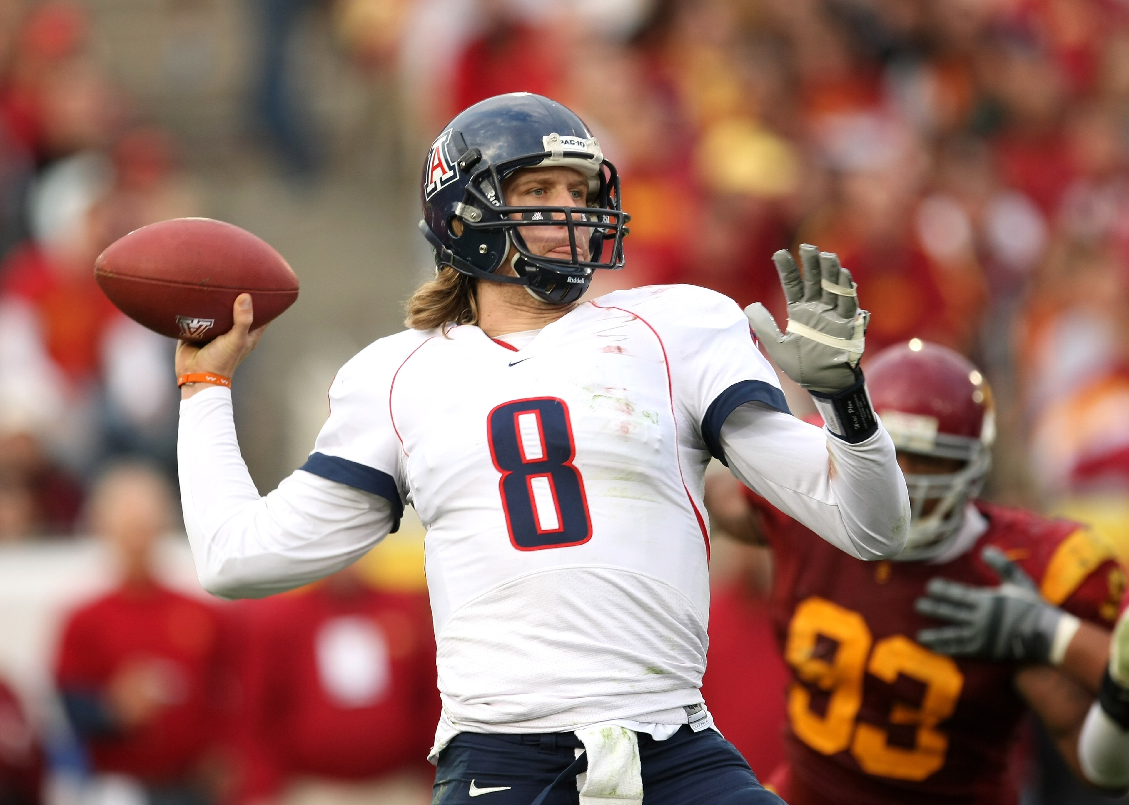 LOS ANGELES - DECEMBER 5:  Quarterback Nick Foles #8 of the Arizona Wildcats throws a pass against the USC Trojans on December 5, 2009 at the Los Angeles Coliseum in Los Angeles, California. Arizona won 21-17.   (Photo by Stephen Dunn/Getty Images)