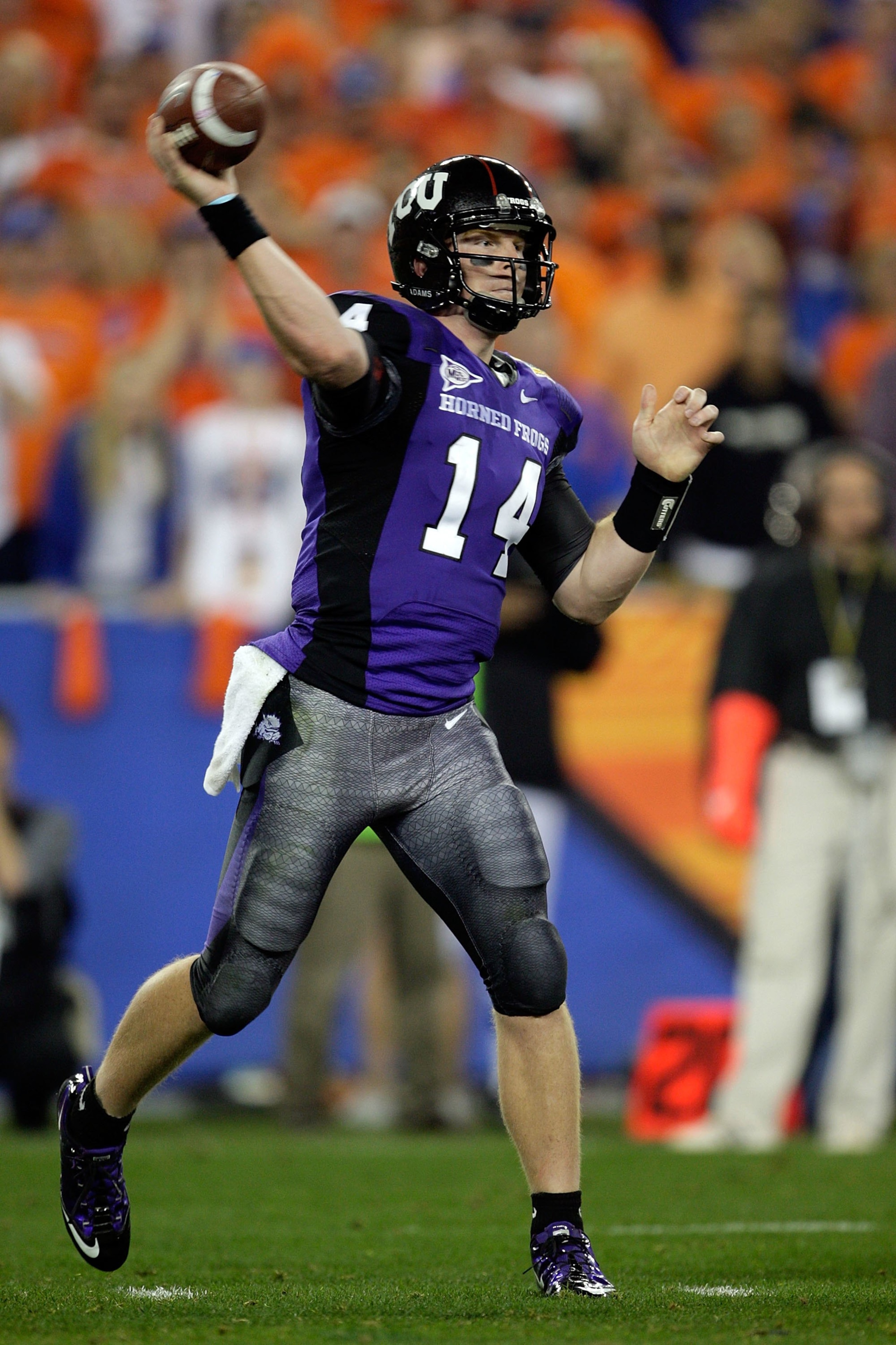 GLENDALE, AZ - JANUARY 04:  Quarterback Andy Dalton #14 of the TCU Horned Frogs passes the ball against the Boise State Broncos during the Tostitos Fiesta Bowl at the Universtity of Phoenix Stadium on January 4, 2010 in Glendale, Arizona.  (Photo by Jamie