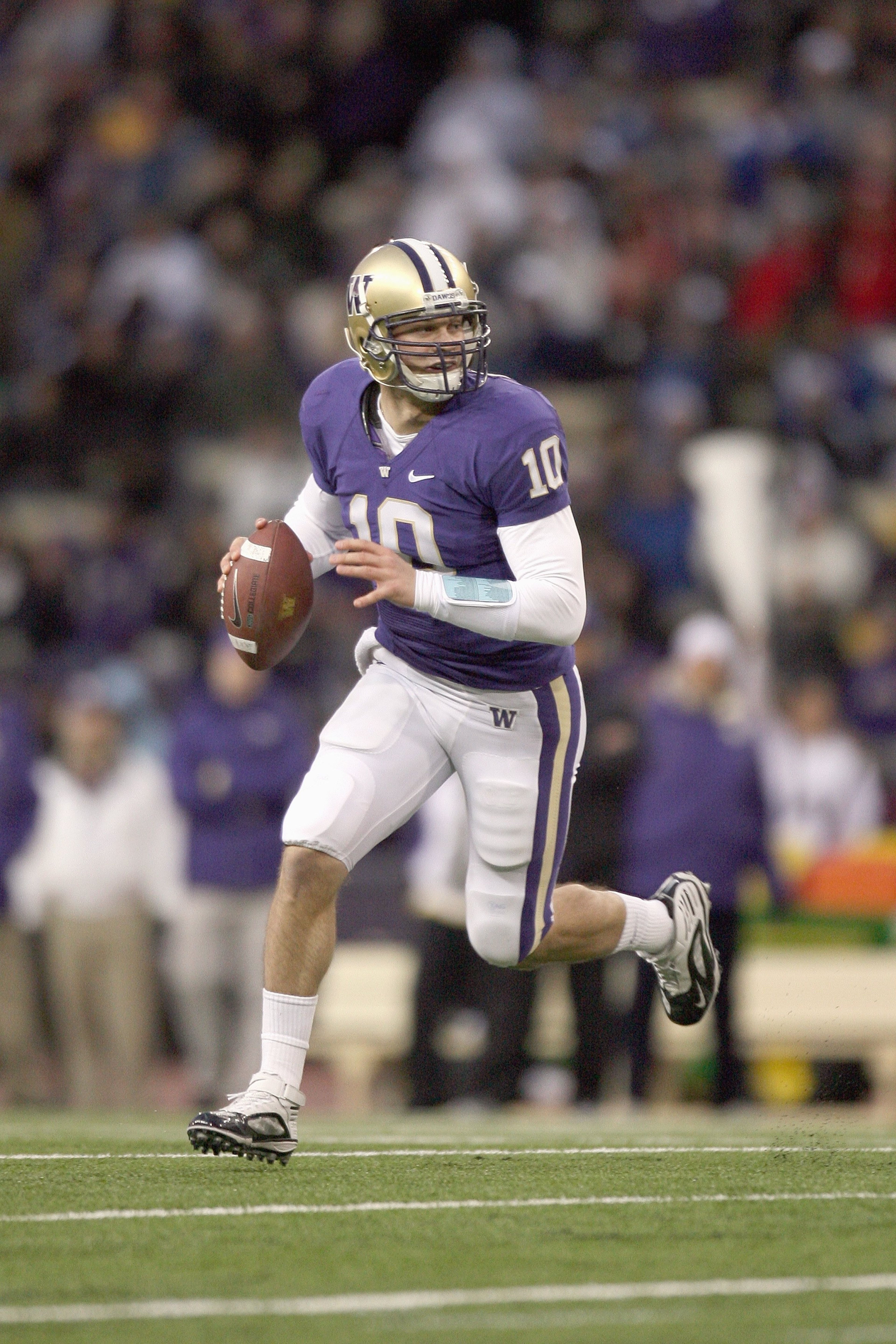 SEATTLE - DECEMBER 05: Quarterback Jake Locker #10 of the Washington Huskies moves to pass the ball during game against the California Bears on December 5, 2009 at Husky Stadium in Seattle, Washington. The Huskies defeated the Bears 42-10. (Photo by Otto