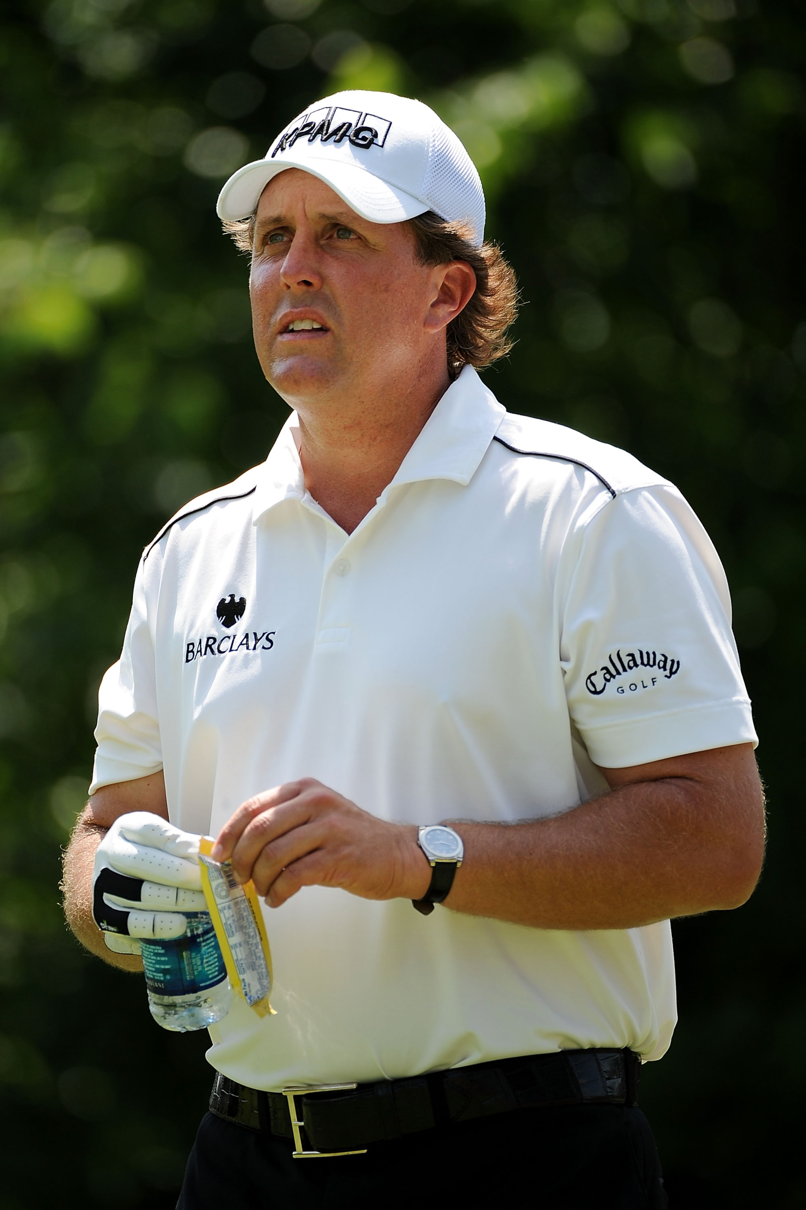 PONTE VEDRA BEACH, FL - MAY 09:  Phil Mickelson watches play while eating a snack during the second round of THE PLAYERS Championship on THE PLAYERS Stadium Course at TPC Sawgrass on May 9, 2008 in Ponte Vedra Beach, Florida.  (Photo by Sam Greenwood/Gett