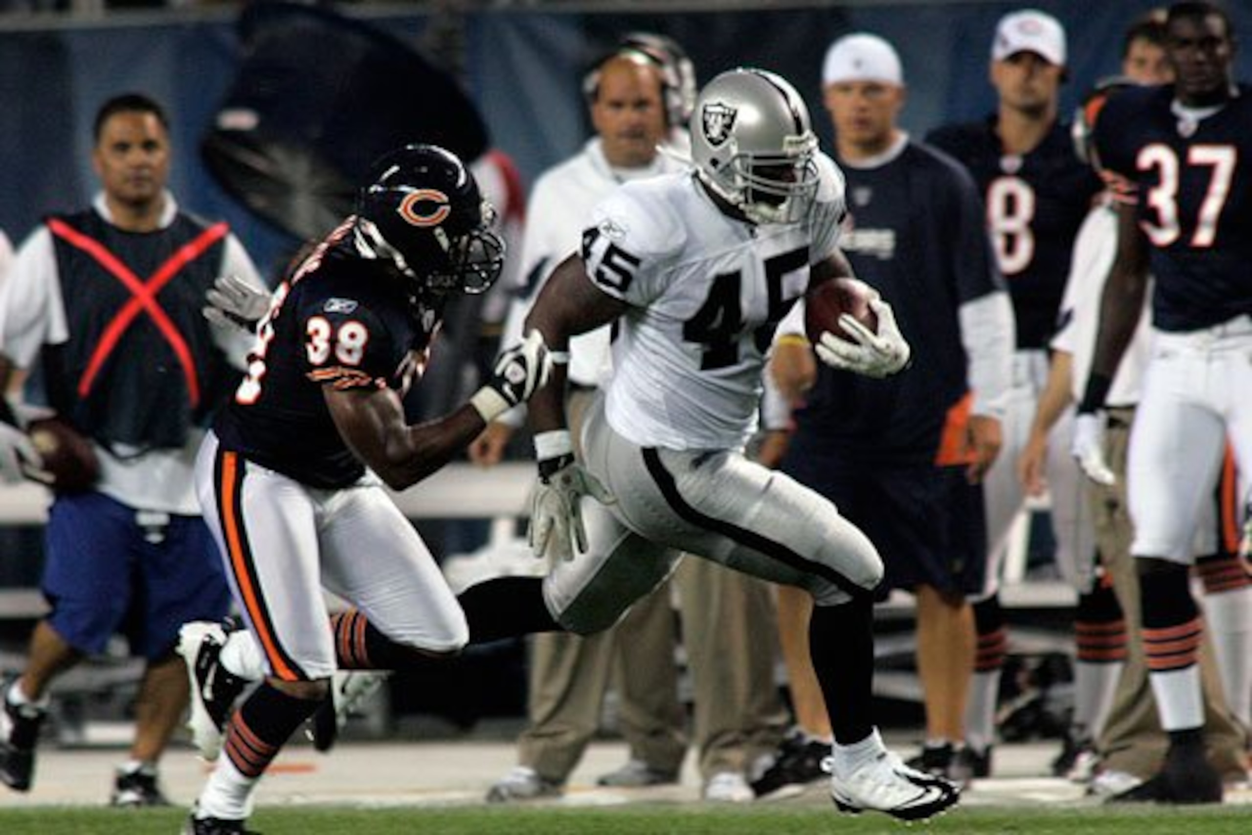 Marcel Reece takes a screen pass 40 yards