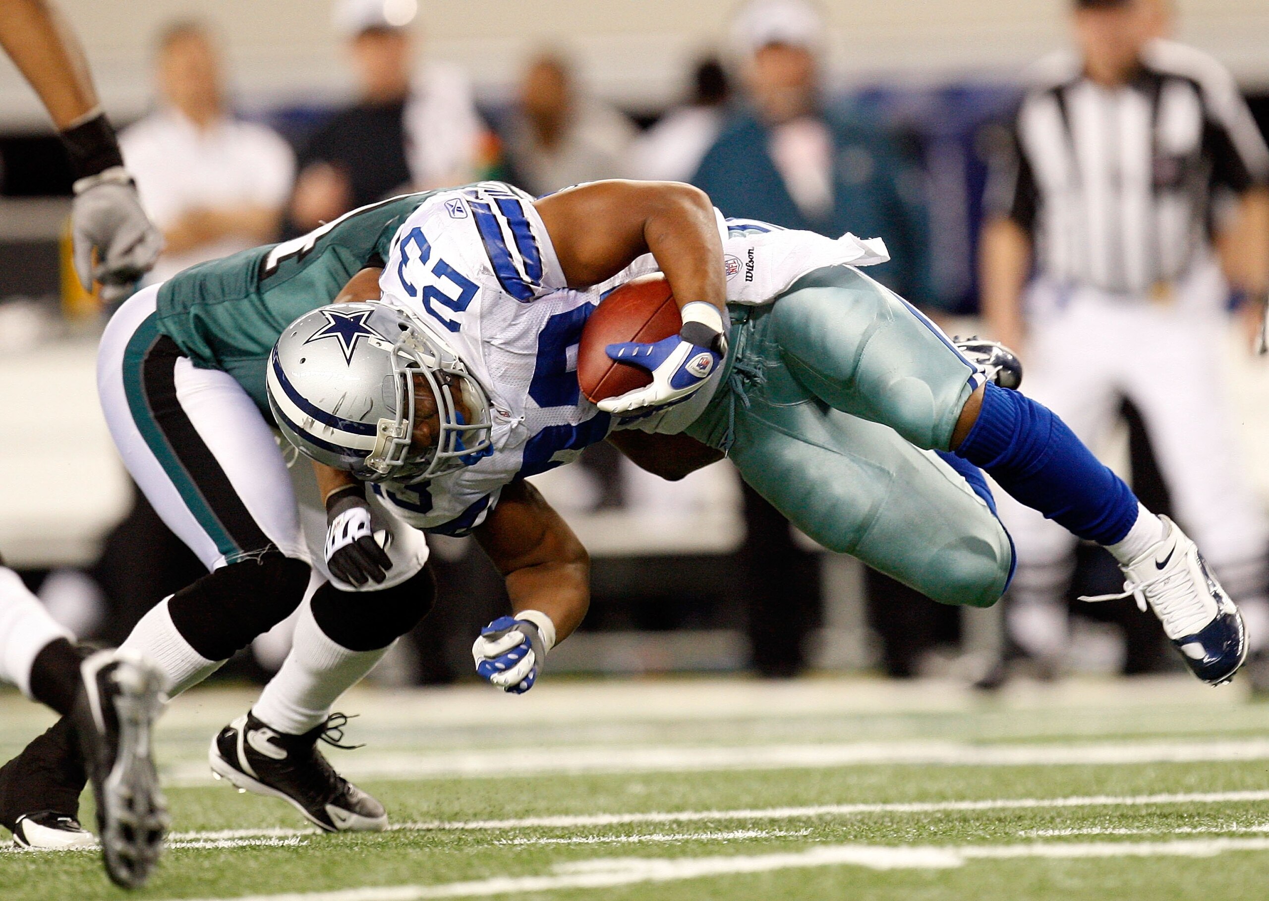 ARLINGTON, TX - JANUARY 09:  Running back Tashard Choice #23 of the Dallas Cowboys during the 2010 NFC wild-card playoff game at Cowboys Stadium on January 9, 2010 in Arlington, Texas.  (Photo by Ronald Martinez/Getty Images)