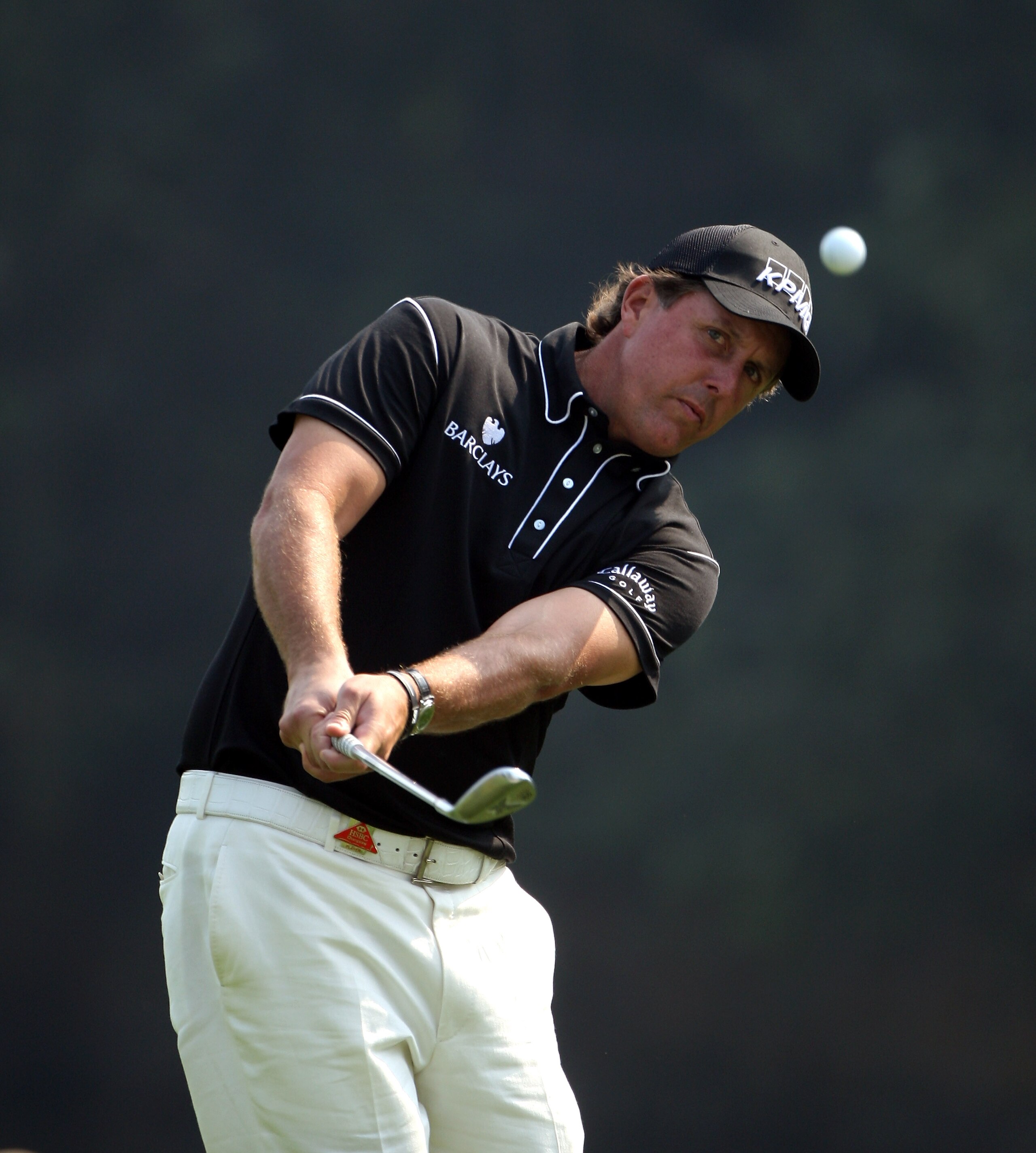 SHANGHAI, CHINA - NOVEMBER 06:  Phil Mickelson of the USA plays a chip shot on the fourth hole during the second round of the WGC-HSBC Champions at Sheshan International Golf Club on November 6, 2009 in Shanghai, China.  (Photo by Andrew Redington/Getty I