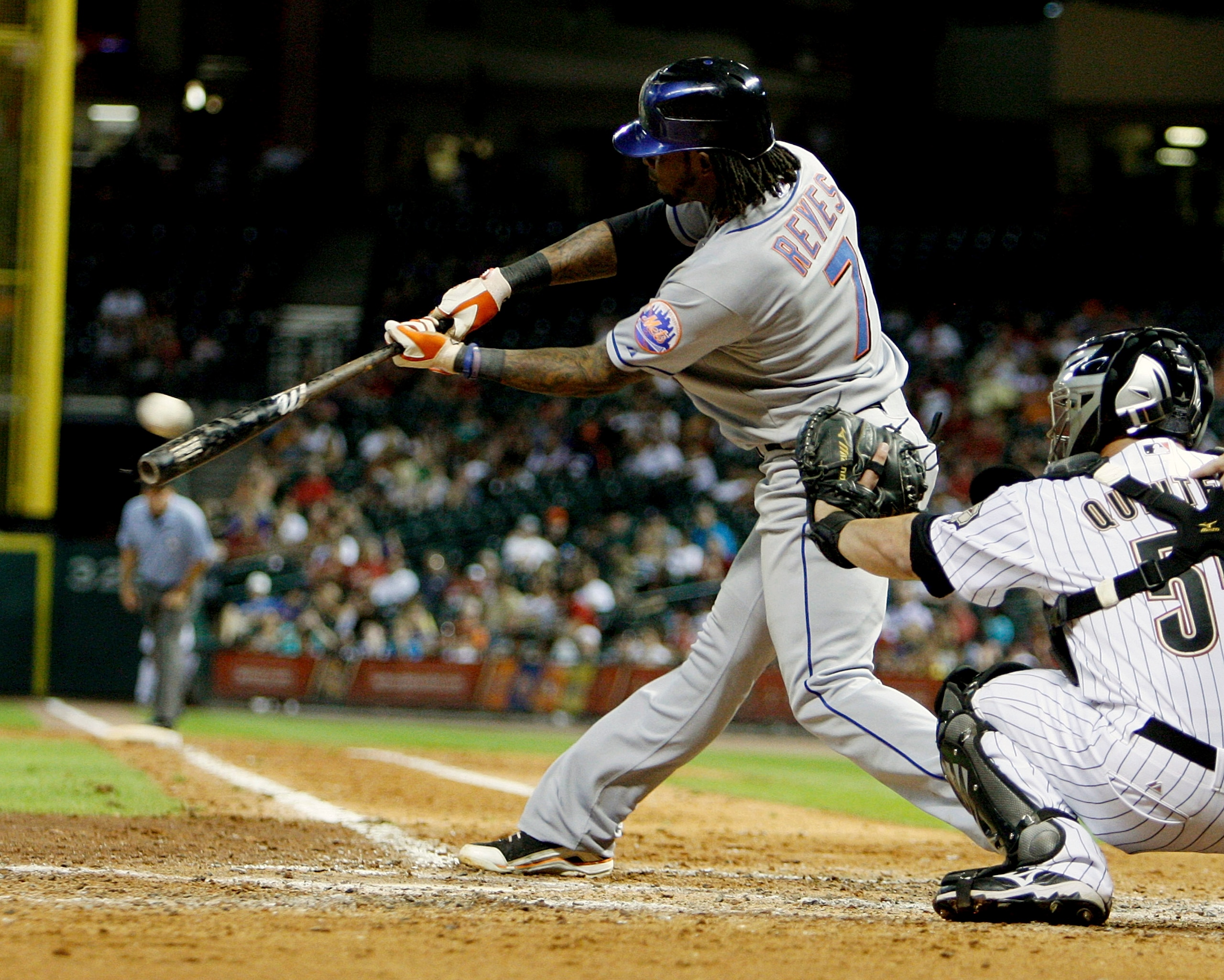 HOUSTON - AUGUST 19:  Jose Reyes #7 of the New York Mets singles up the middle in the eighth inning against the Houston Astros at Minute Maid Park on August 19, 2010 in Houston, Texas.  (Photo by Bob Levey/Getty Images)