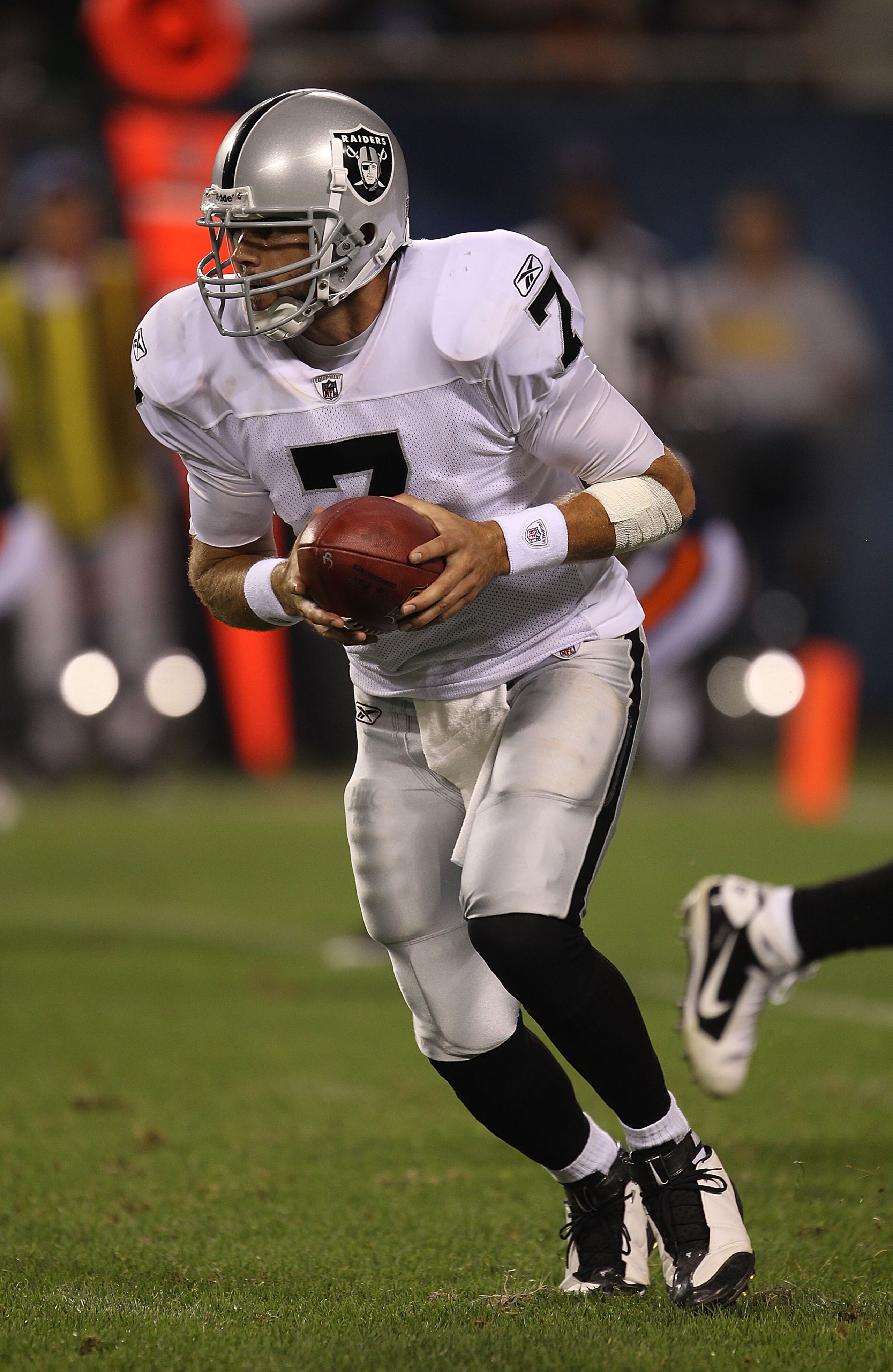 CHICAGO - AUGUST 21: Kyle Boller #7 of the Oakland Raiders turns to hand-off against the Chicago Bears during a preseason game at Soldier Field on August 21, 2010 in Chicago, Illinois. The Raiders defeated the Bears 32-17.  (Photo by Jonathan Daniel/Getty
