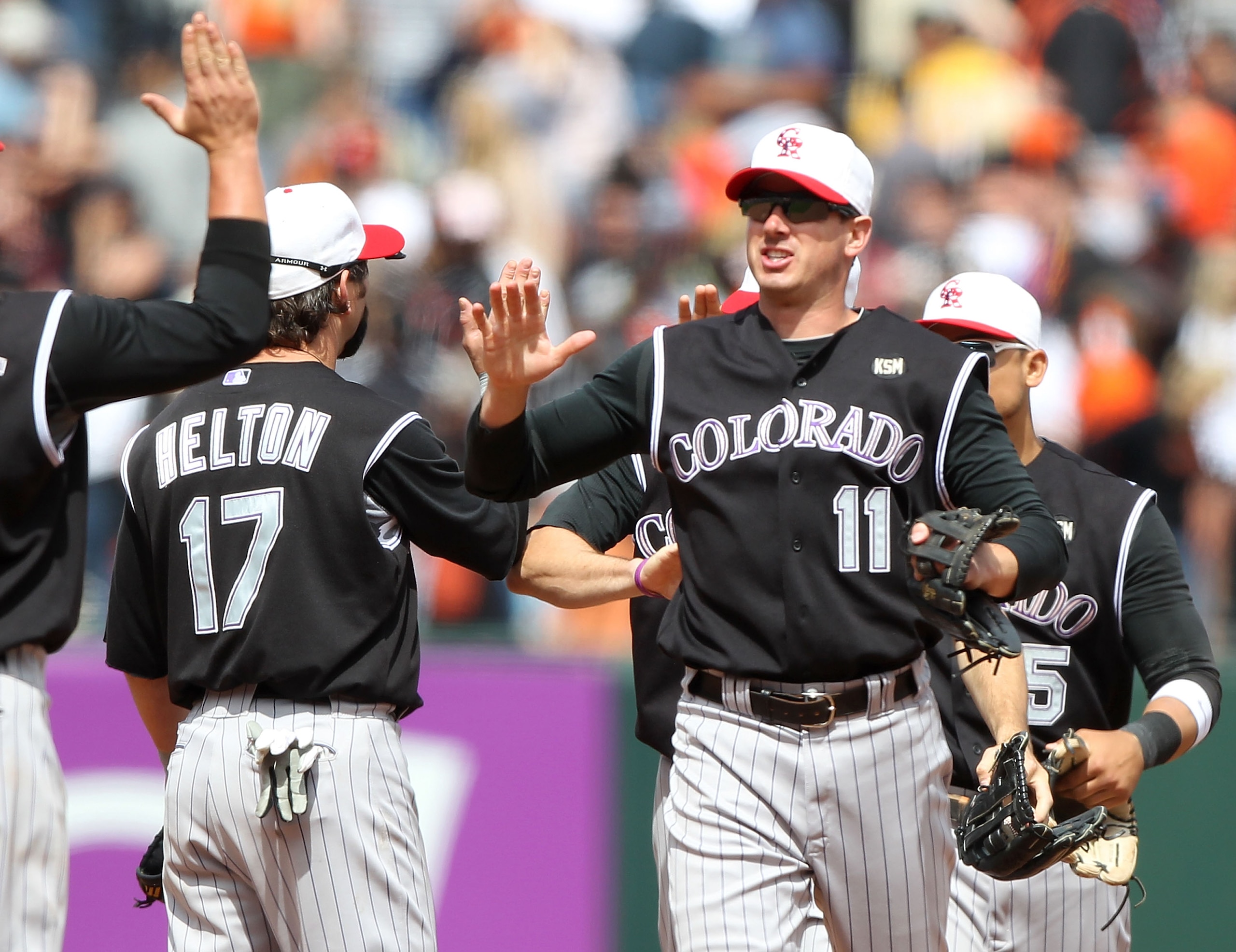 SAN FRANCISCO - MAY 31:  Brad Hawpe #11 of the Colorado Rockies celebrates after defeating the San Francisco Giants during an MLB game at AT&T Park on May 31, 2010 in San Francisco, California.  (Photo by Jed Jacobsohn/Getty Images)