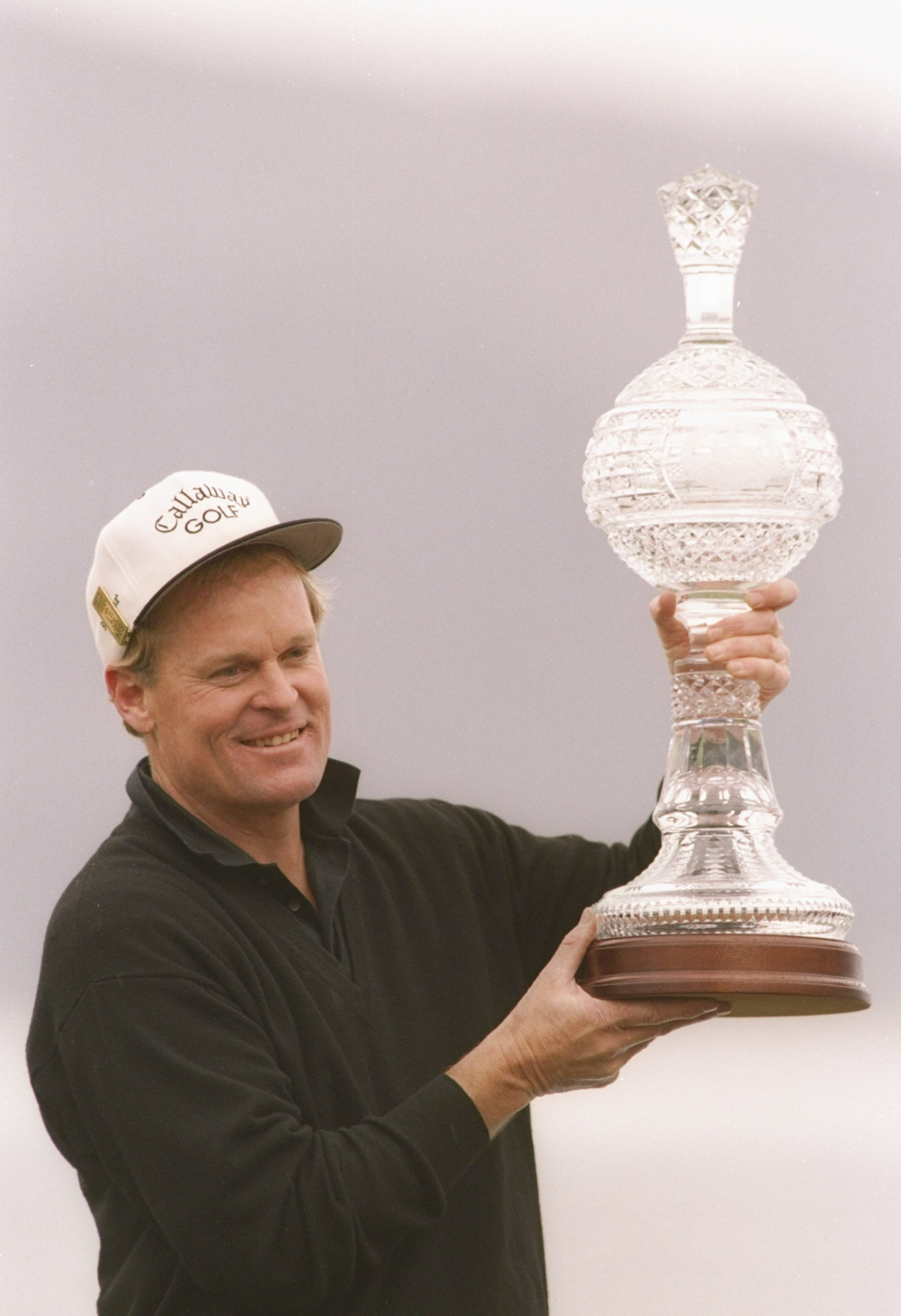 3 Feb 1994:  Johnny Miller poses with a trophy after the AT&T Pebble Beach National Pro-Am. Mandatory Credit: Gary Newkirk  /Allsport