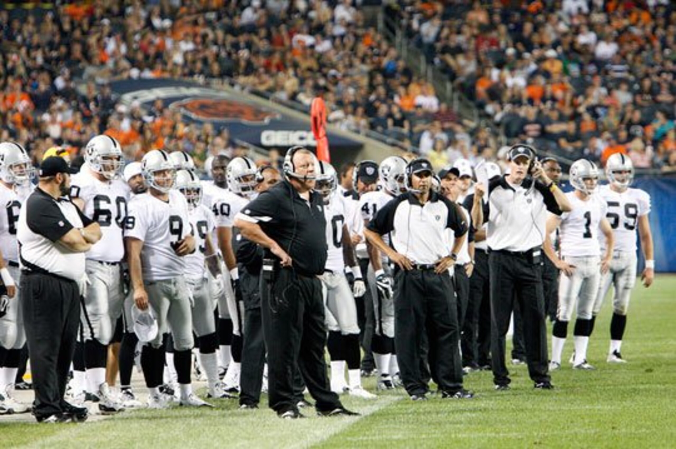 Coach cable and the staff eagerly await a call from the officials.