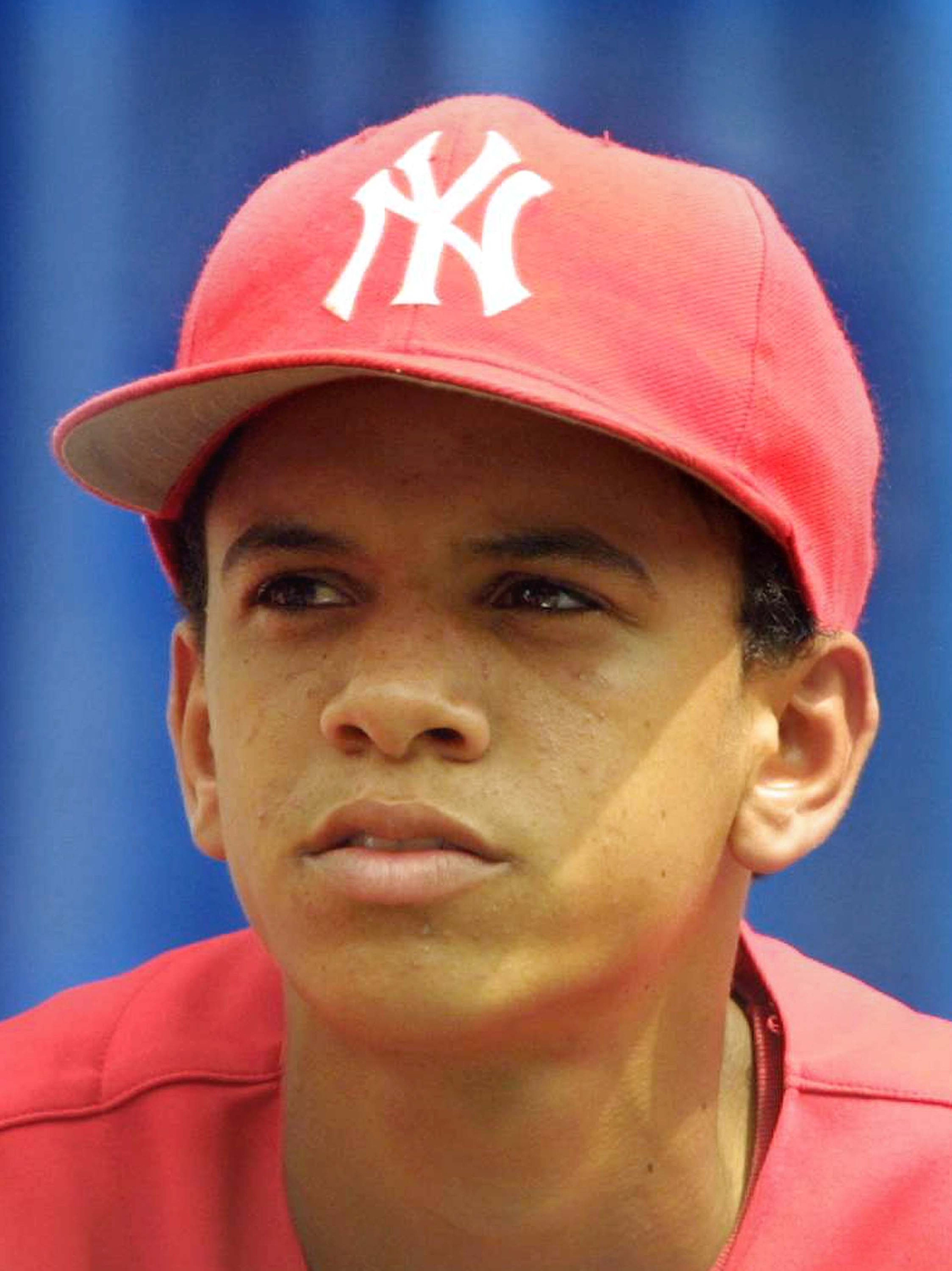 393788 02: (FILE PHOTO) Danny Almonte of the Rolando Paulino All-Stars Bronx Little League baseball team attends a ceremony honoring the team August 28, 2001 in New York City. Dominican Republic officials said August 31, 2001 that Little League pitcher Da