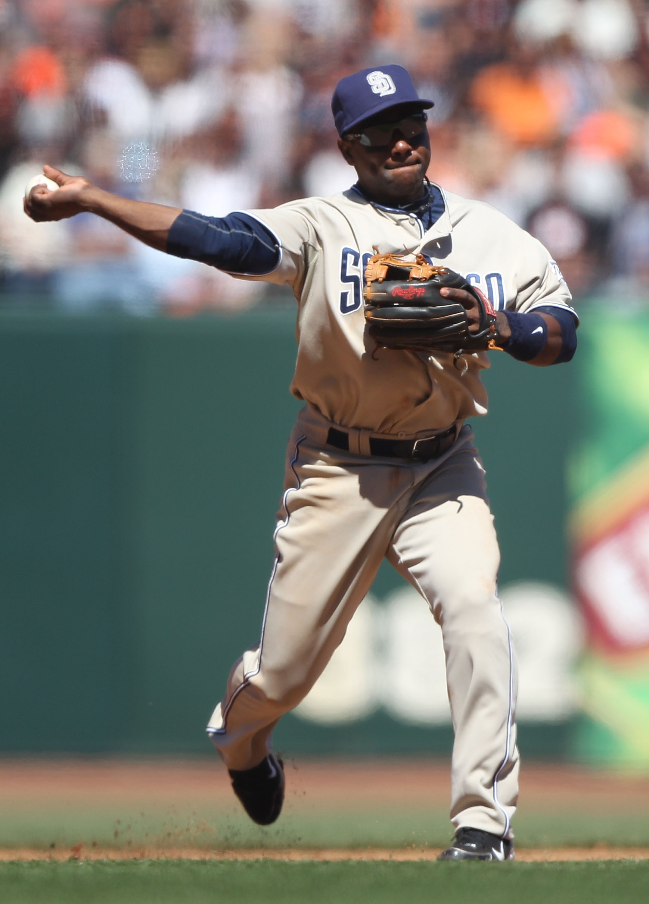 SAN FRANCISCO - AUGUST 15:  Miguel Tejada #10 of the San Diego Padres throws to first against the San Francisco Giants during an MLB game at AT&T Park on August 15, 2010 in San Francisco, California.  (Photo by Jed Jacobsohn/Getty Images)