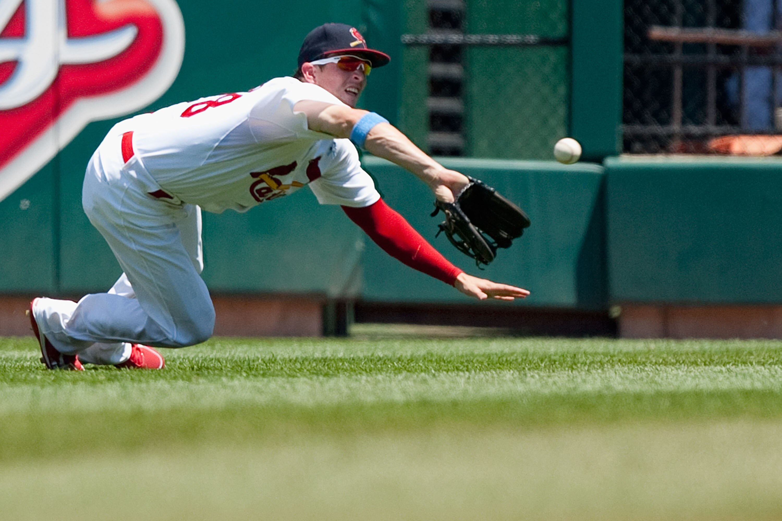 ST. LOUIS - JUNE 20: Colby Rasmus #28 of the St. Louis Cardinals catches a fly ball against the Oakland Athletics at Busch Stadium on June 20, 2010 in St. Louis, Missouri.  The Athletics beat the Cardinals 3-2.  (Photo by Dilip Vishwanat/Getty Images)