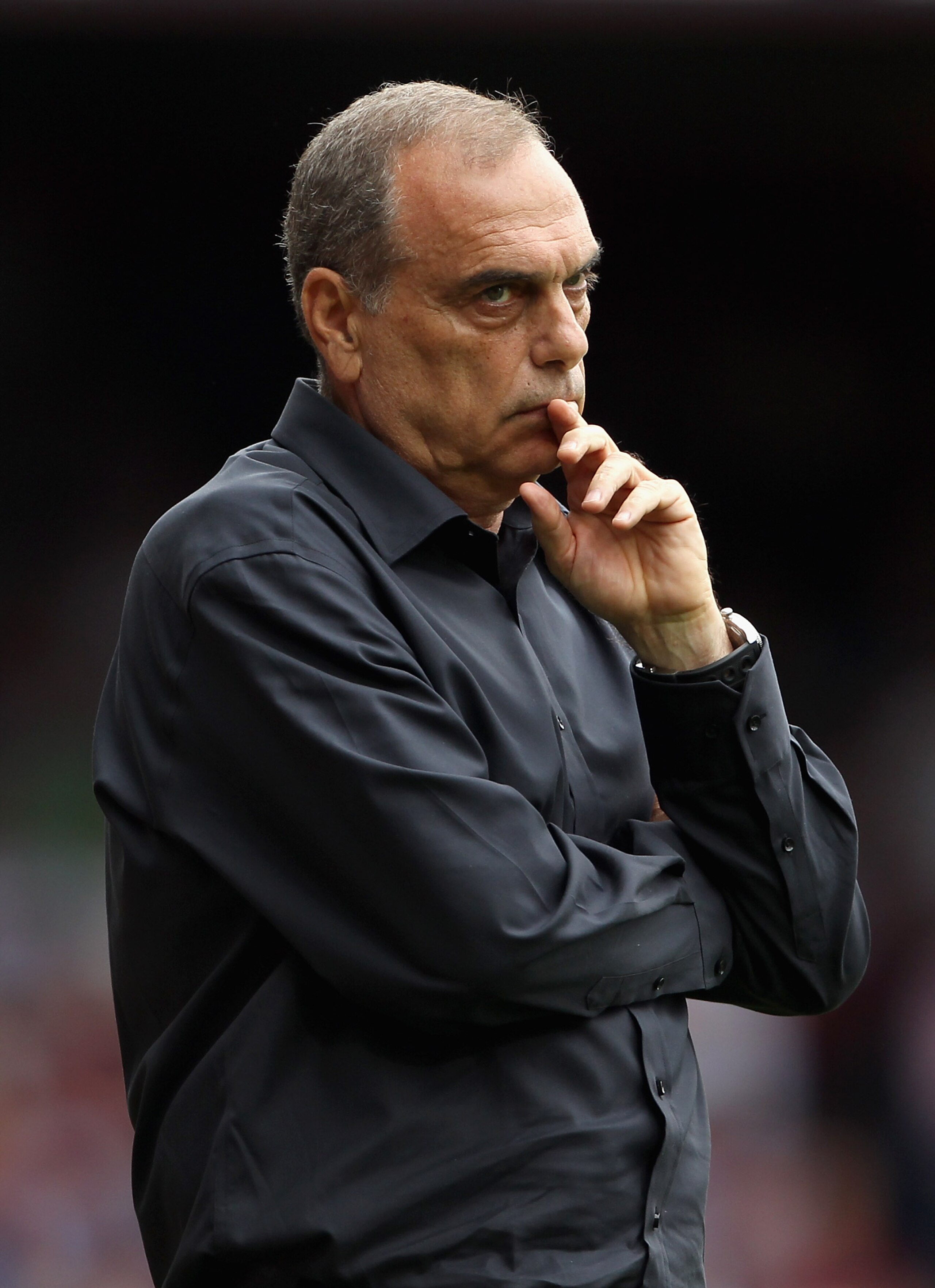 LONDON, ENGLAND - AUGUST 21:  West Ham United manager Avram Grant looks thoughtful during the Barclays Premier League match between West Ham United and Bolton Wanderers at the Boleyn Ground on August 21, 2010 in London, England.  (Photo by Phil Cole/Getty