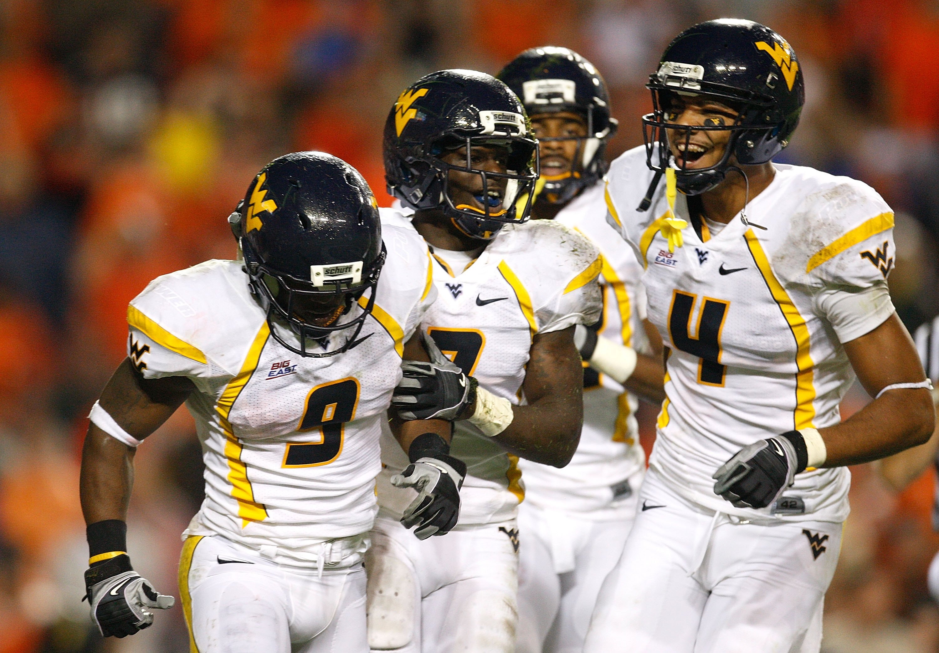 AUBURN, AL - SEPTEMBER 19:  Jock Sanders #9, Noel Devine #7 and Wes Lyons #4 of the West Virginia Mountaineers against the Auburn Tigers at Jordan-Hare Stadium on September 19, 2009 in Auburn, Alabama.  (Photo by Kevin C. Cox/Getty Images)