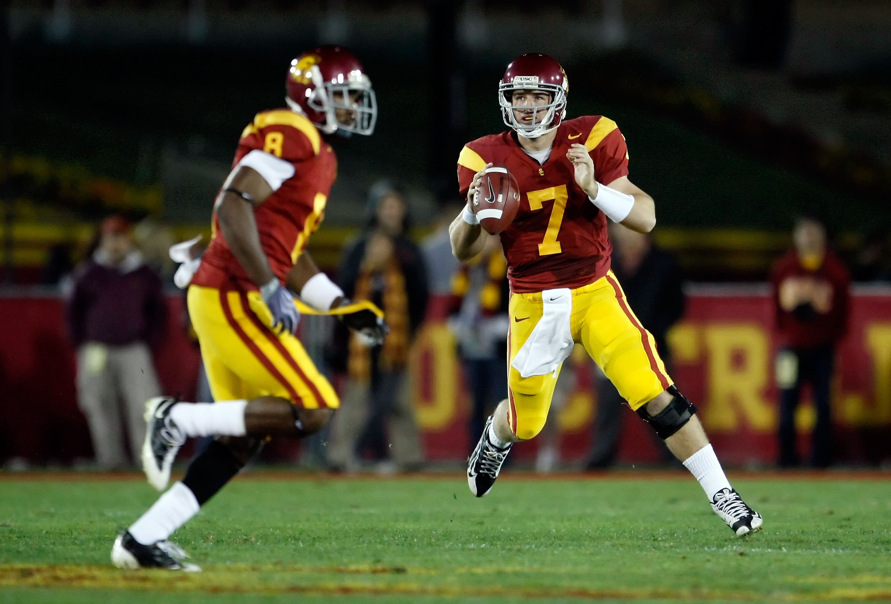 LOS ANGELES, CA - NOVEMBER 28:  Matt Barkley #7 of the USC Trojans looks down field for an open receiver during the first half against the UCLA Bruins at the Los Angeles Memorial Coliseum on November 28, 2009 in Los Angeles, California.  (Photo by Jeff Gr