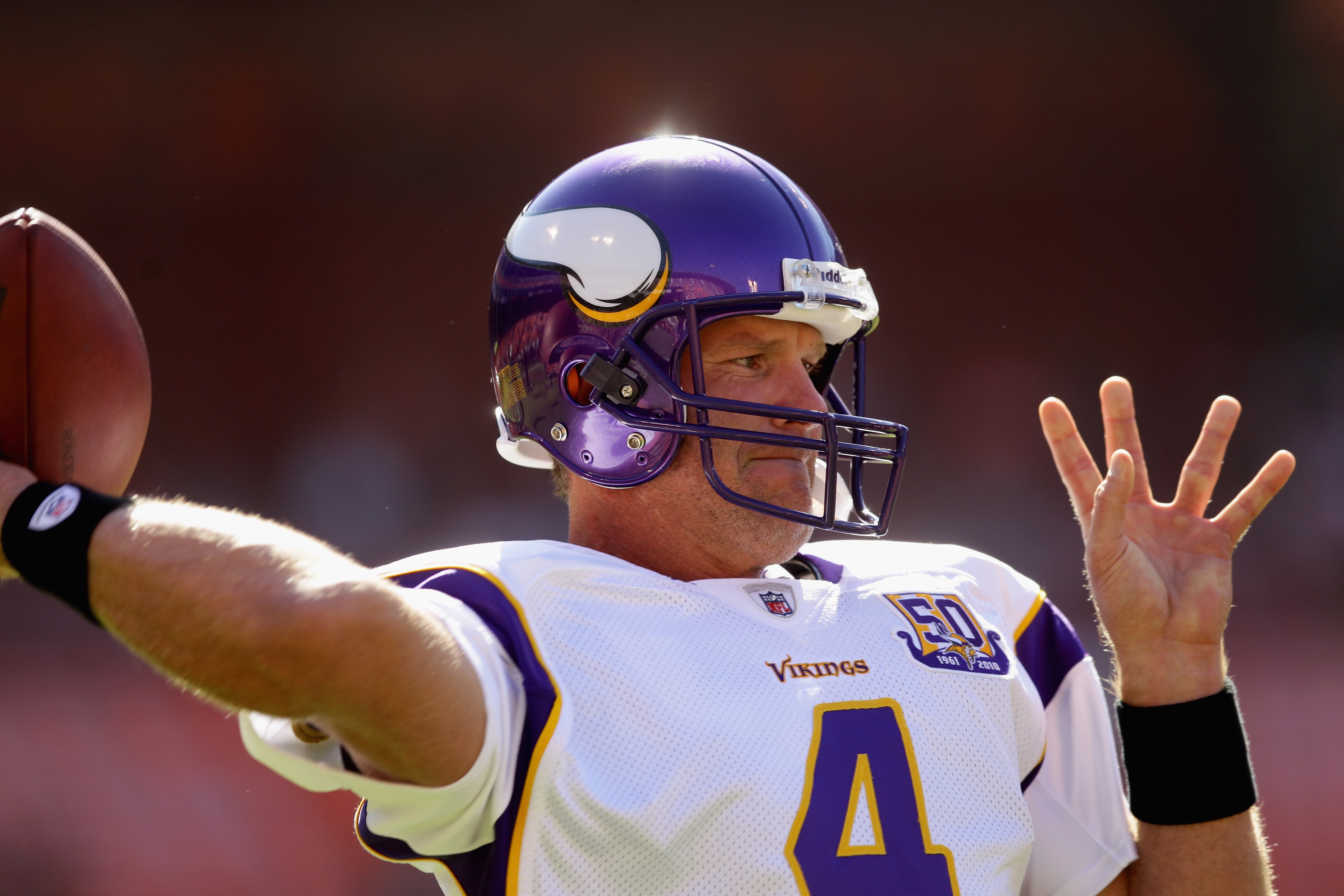 SAN FRANCISCO - AUGUST 22:  Brett Favre #4 of the Minnesota Vikings warms up before their preseason game against the San Francisco 49ers at Candlestick Park on August 22, 2010 in San Francisco, California.  (Photo by Ezra Shaw/Getty Images)