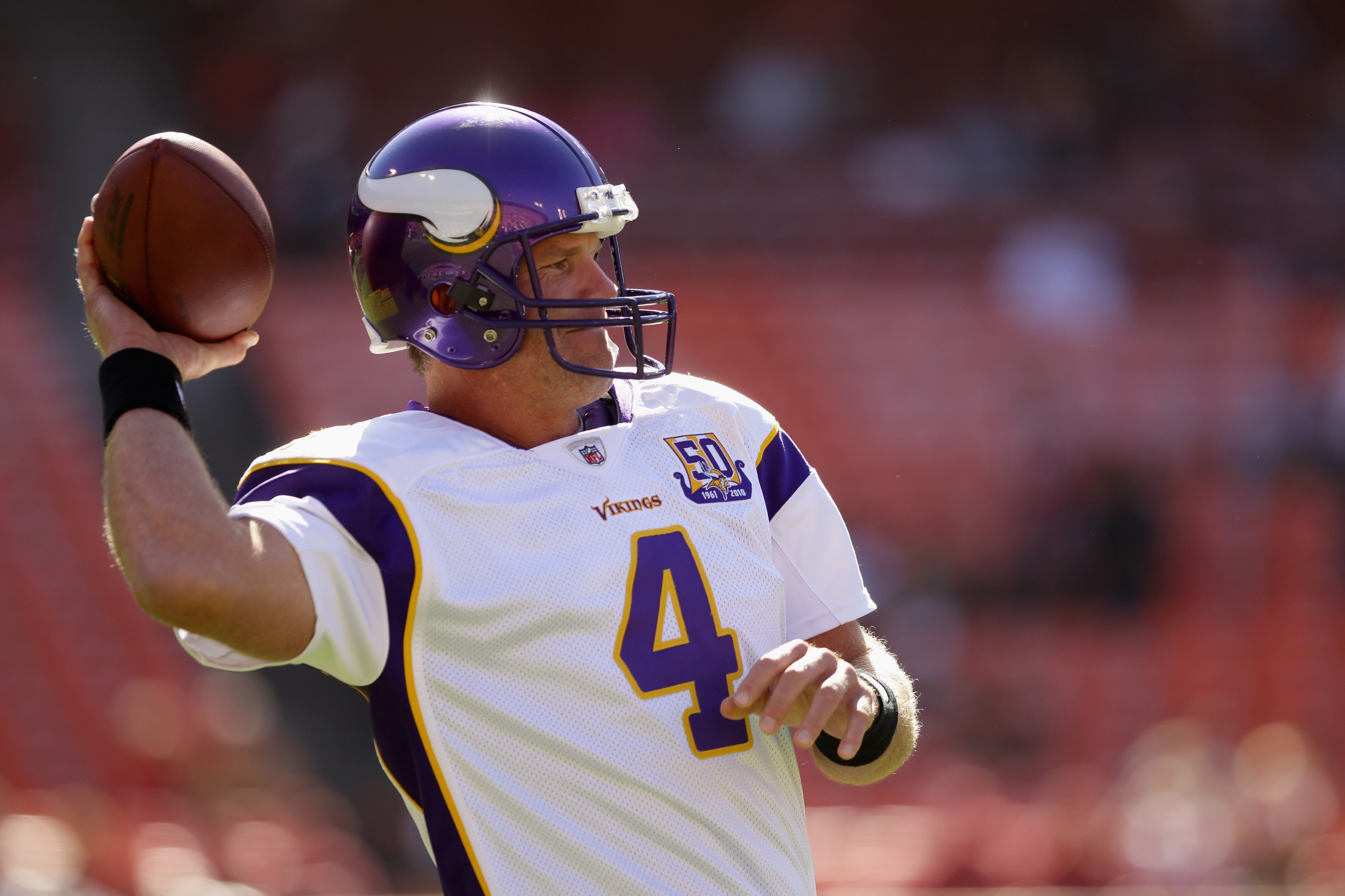 SAN FRANCISCO - AUGUST 22:  Brett Favre #4 of the Minnesota Vikings warms up before their preseason game against the San Francisco 49ers at Candlestick Park on August 22, 2010 in San Francisco, California.  (Photo by Ezra Shaw/Getty Images)