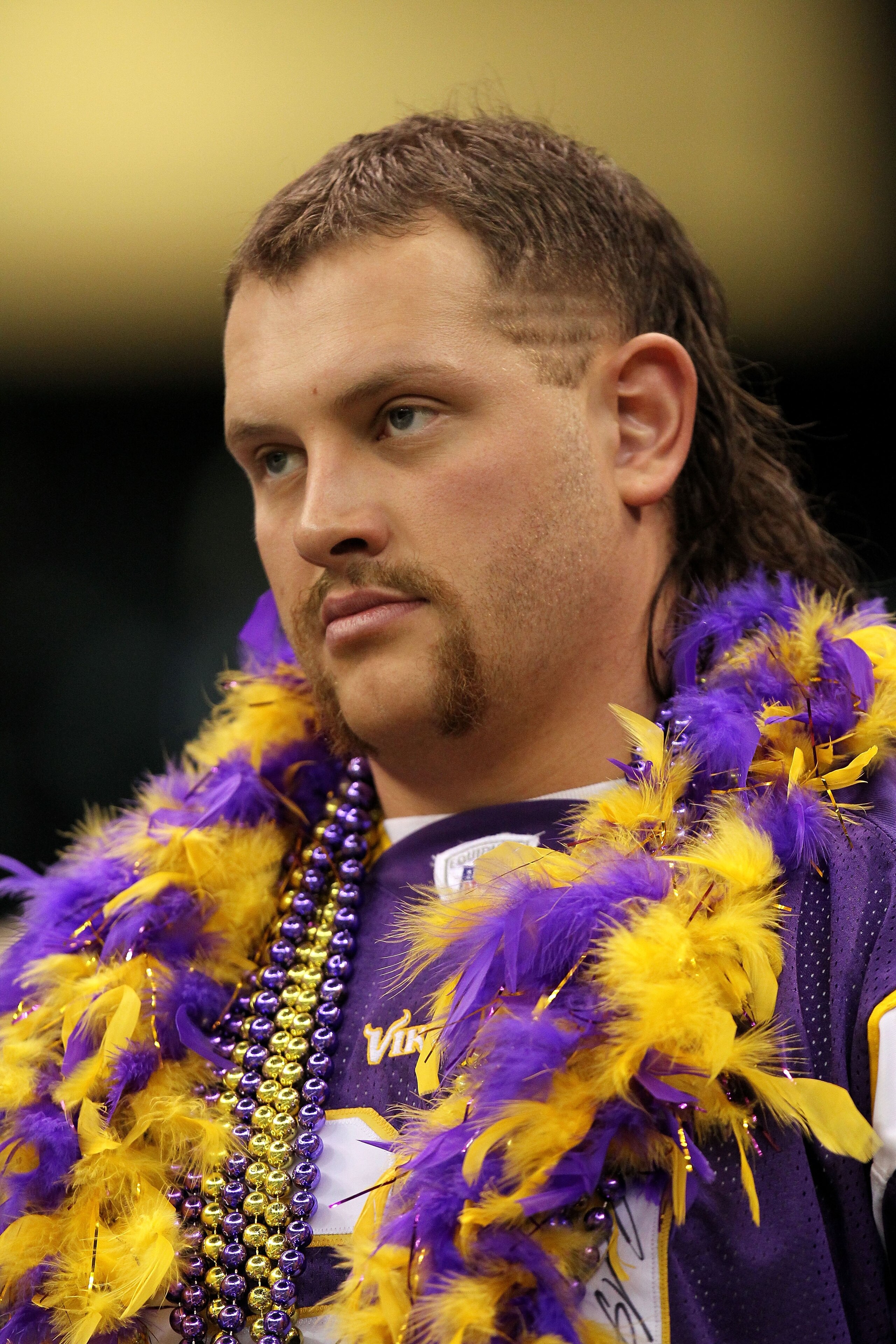 NEW ORLEANS - JANUARY 24:  A fan of the Minnesota Vikings looks on dejected against the New Orleans Saints during the NFC Championship Game at the Louisiana Superdome on January 24, 2010 in New Orleans, Louisiana. The Saints won 31-28. (Photo by Ronald Ma