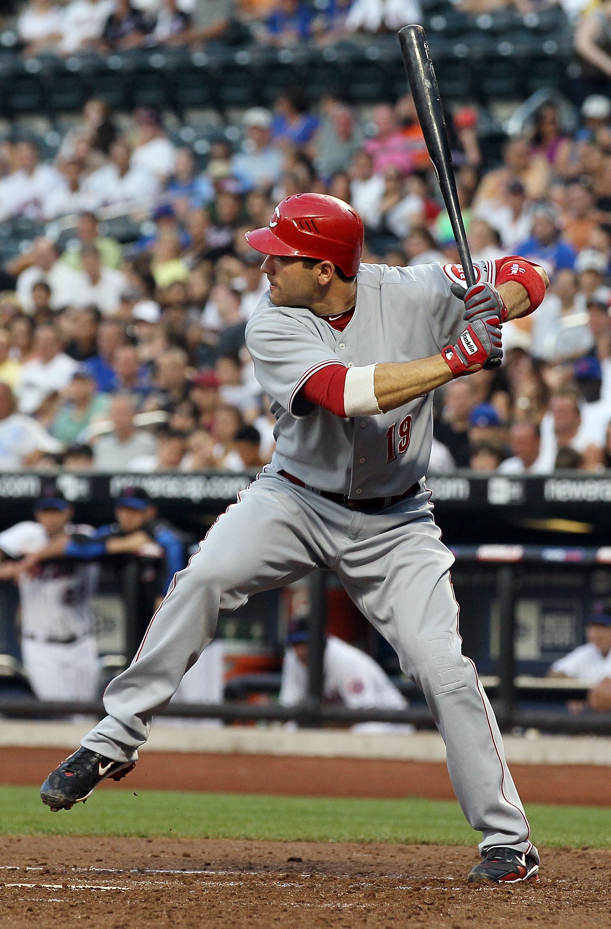 NEW YORK - JULY 05:  Joey Votto #19 of the Cincinnati Reds bats against the New York Mets on July 5, 2010 at Citi Field in the Flushing neighborhood of the Queens borough of New York City.  (Photo by Jim McIsaac/Getty Images)