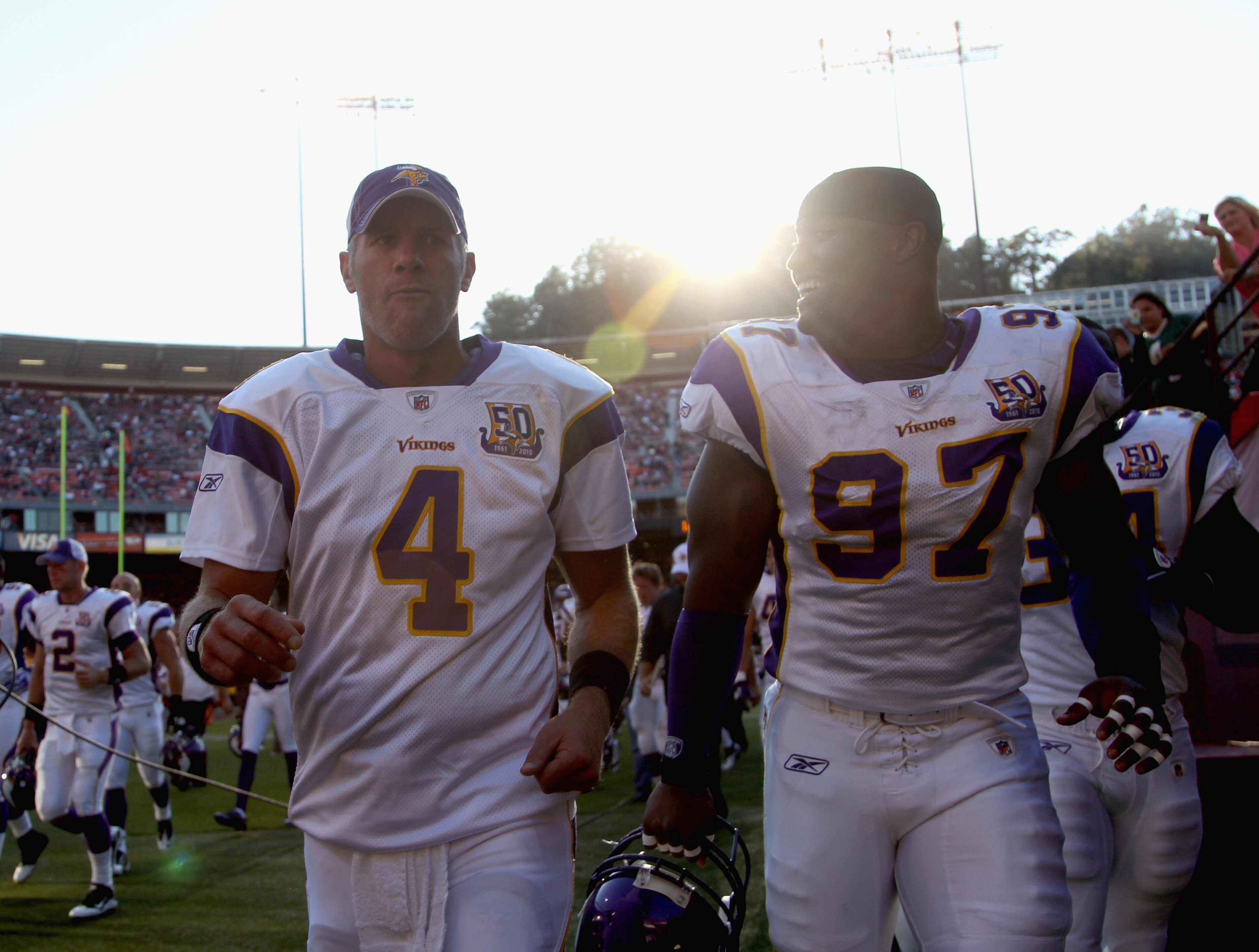 SAN FRANCISCO - AUGUST 22:  Brett Favre #4 of the Minnesota Vikings leaves the field at halftime with Everson Griffen #97 during their preseason game against the San Francisco 49ers at Candlestick Park on August 22, 2010 in San Francisco, California.  (Ph