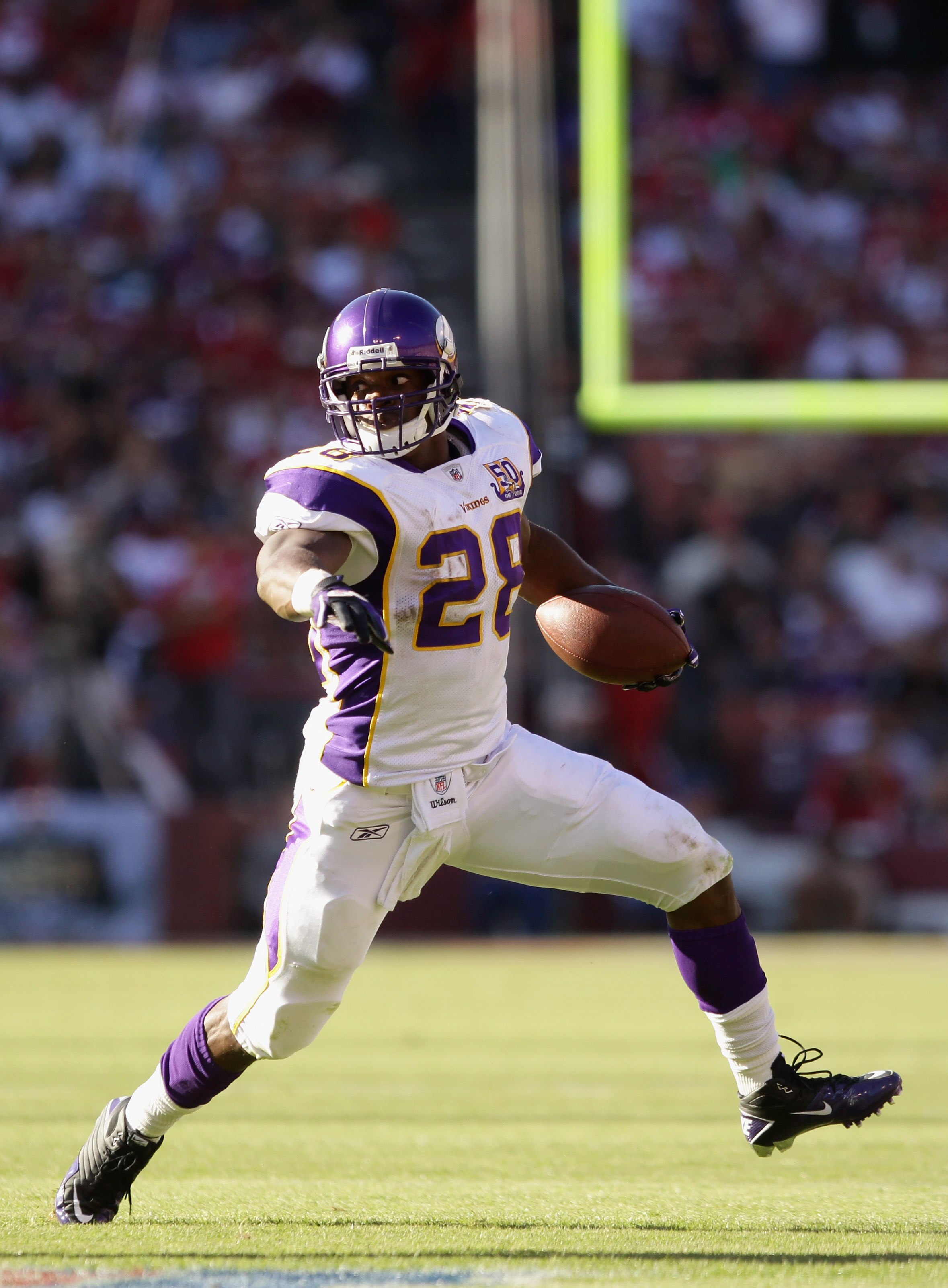 SAN FRANCISCO - AUGUST 22:  Adrian Peterson #28 of the Minnesota Vikings runs with the ball during their preseason game against the San Francisco 49ers at Candlestick Park on August 22, 2010 in San Francisco, California.  (Photo by Ezra Shaw/Getty Images)