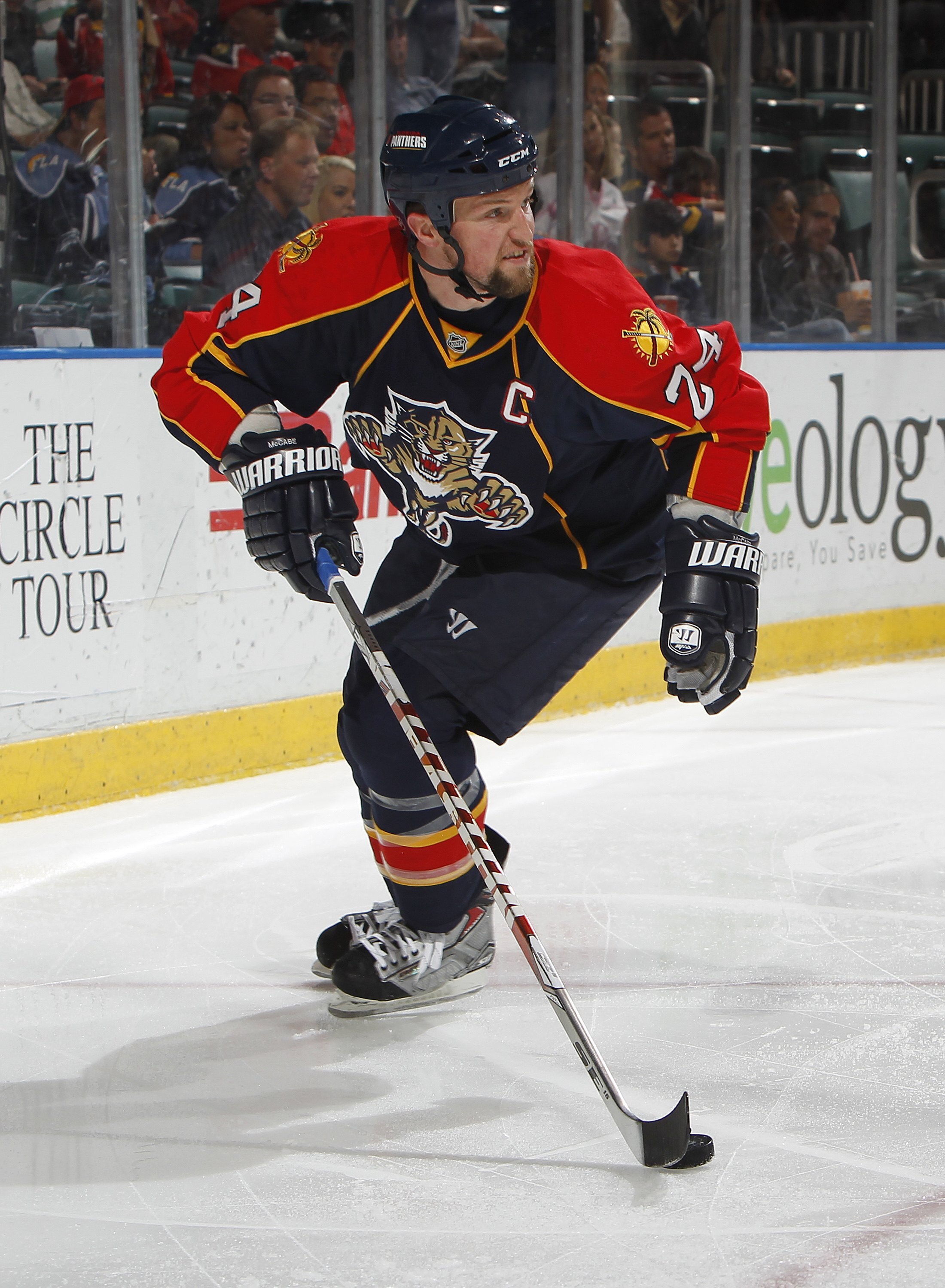SUNRISE, FL - APRIL 6: Bryan McCabe #24 of the Florida Panthers carries the puck behind the net against the Ottawa Senators on April 6, 2010 at the BankAtlantic Center in Sunrise, Florida. The Senators defeated the Panthers 5-2. (Photo by Joel Auerbach/Ge
