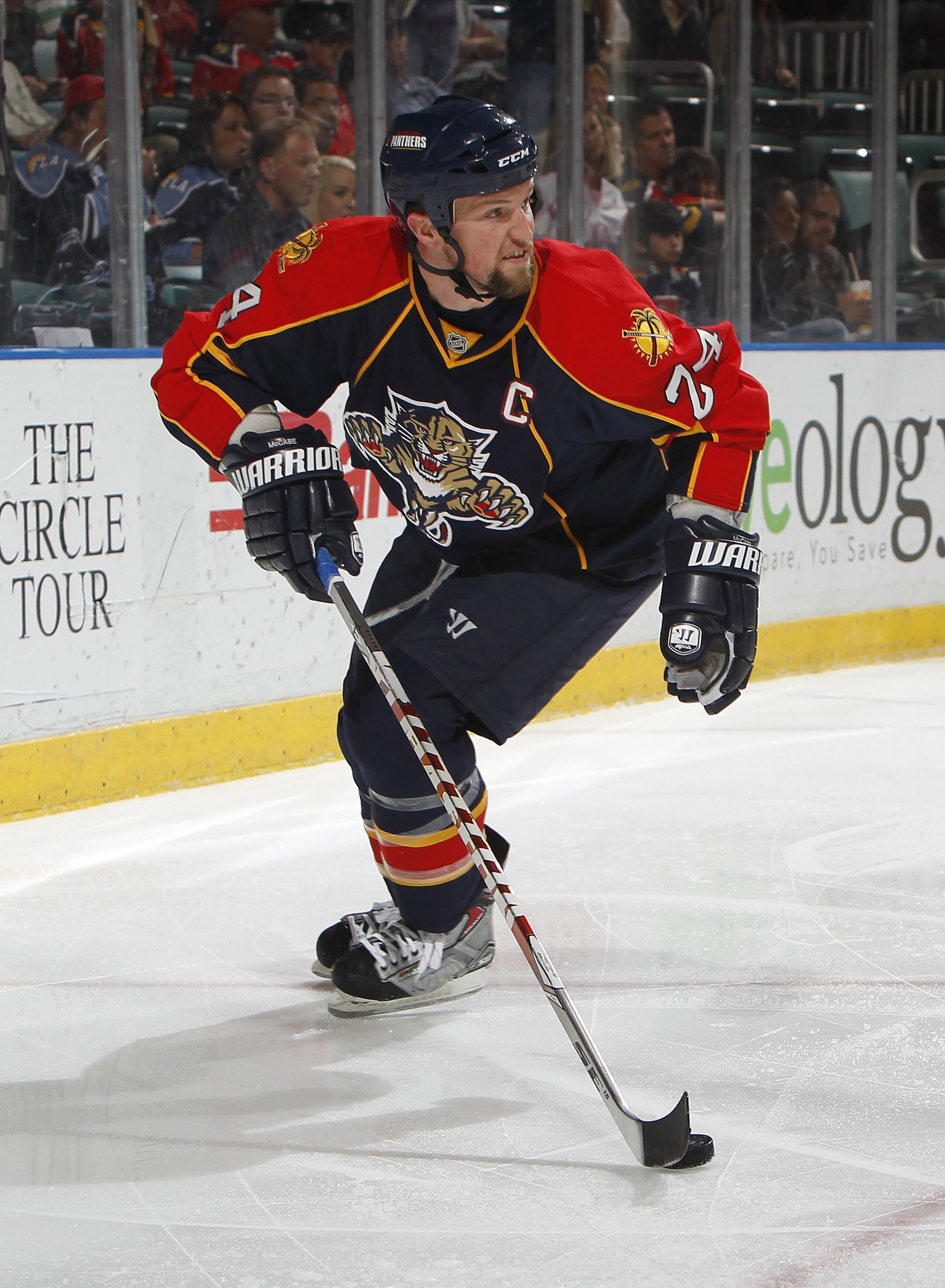 SUNRISE, FL - APRIL 6: Bryan McCabe #24 of the Florida Panthers carries the puck behind the net against the Ottawa Senators on April 6, 2010 at the BankAtlantic Center in Sunrise, Florida. The Senators defeated the Panthers 5-2. (Photo by Joel Auerbach/Ge