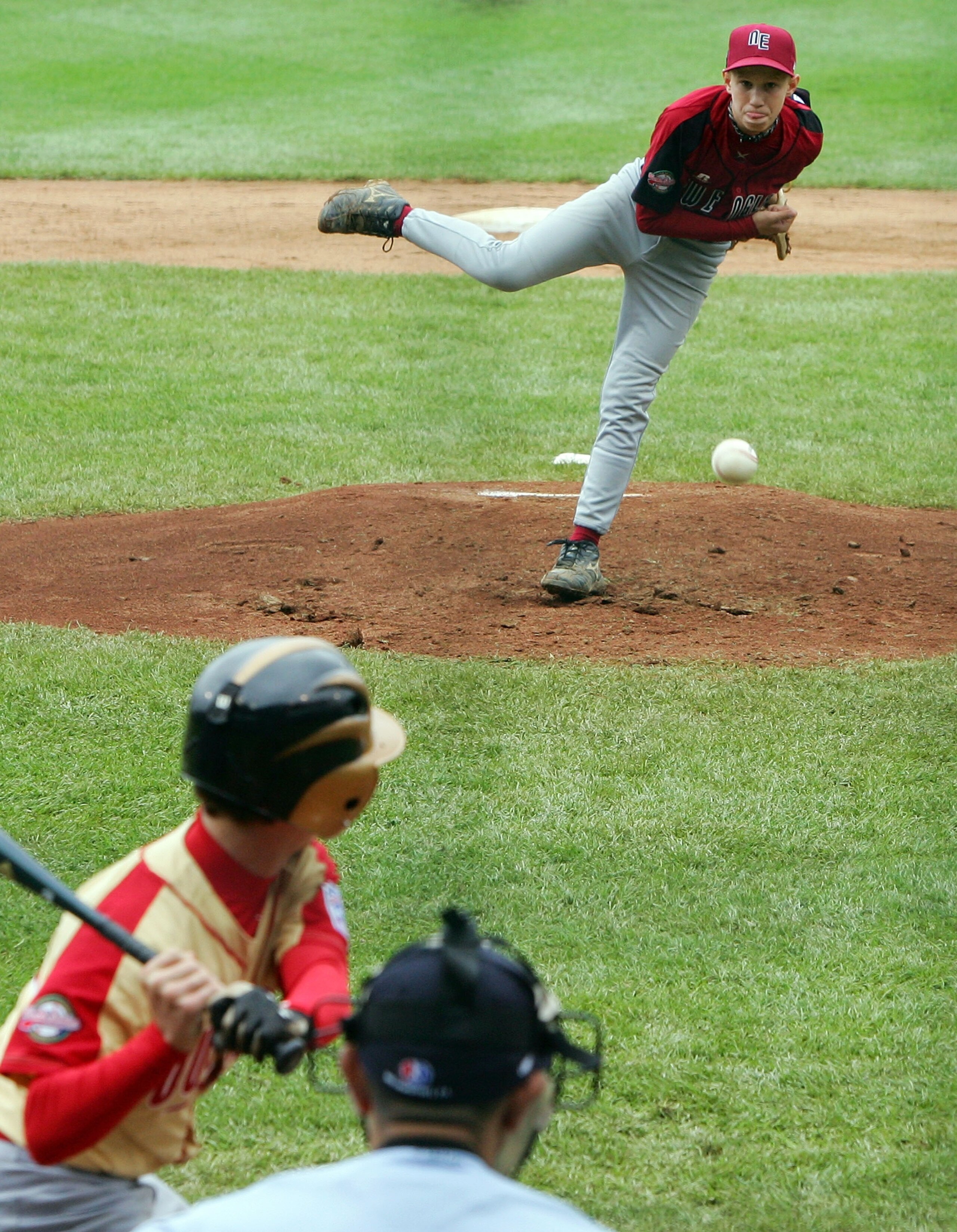 SOUTH WILLIAMSPORT, PA - AUGUST 22: Kyle Donnelly #3 of the New England team from Walpole, Massachusetts pitches to Dalton Carriker #2 of the Southeast team from Warner Robins, Georgia during their tournament game in the Little League World Series on Aug SOUTH WILLIAMSPORT, PA - AUGUST 22: Kyle Donnelly #3 of the New England team from Walpole, Massachusetts pitches to Dalton Carriker #2 of the Southeast team from Warner Robins, Georgia during their tournament game in the Little League World Series on Aug