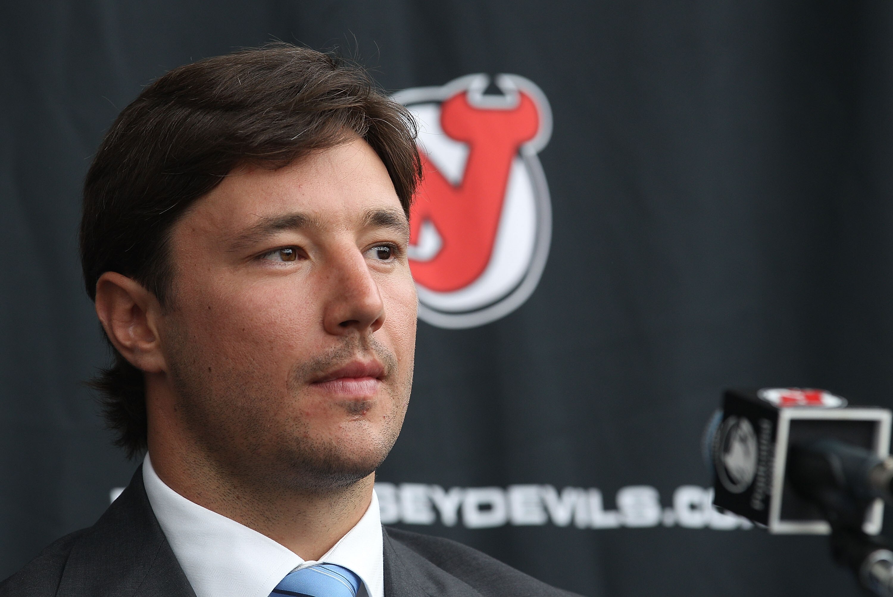 NEWARK, NJ - JULY 20: Ilya Kovalchuk of the New Jersey Devils speaks with the media after announcing his contract renewal at the Prudential Center on July 20, 2010 in Newark, New Jersey. (Photo by Bruce Bennett/Getty Images)