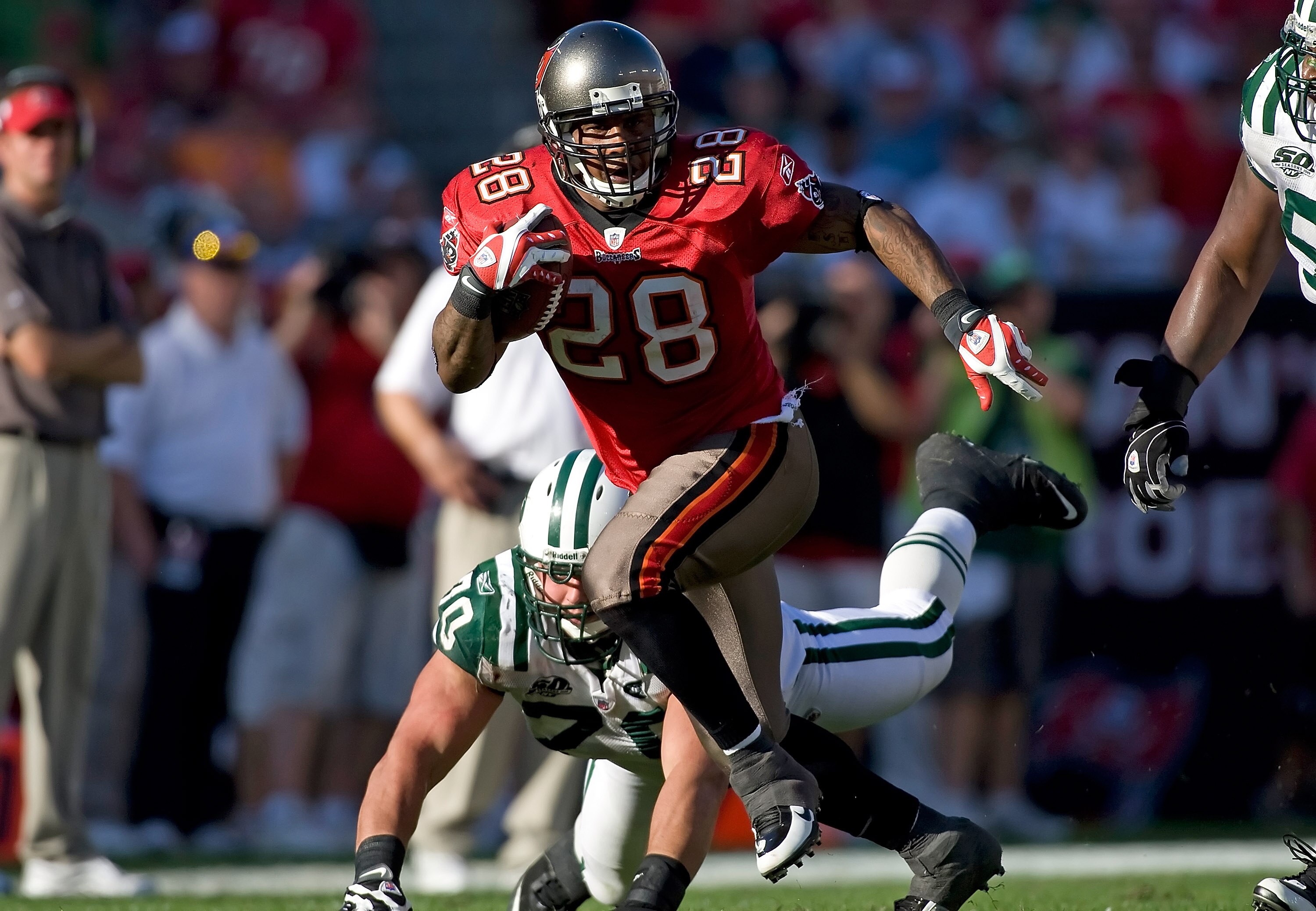 TAMPA, FL - DECEMBER 13:  Running back Derrick Ward #28 of the Tampa Bay Buccaneers runs the ball against the New York Jets during the game at Raymond James Stadium on December 13, 2009 in Tampa, Florida.  (Photo by J. Meric/Getty Images)
